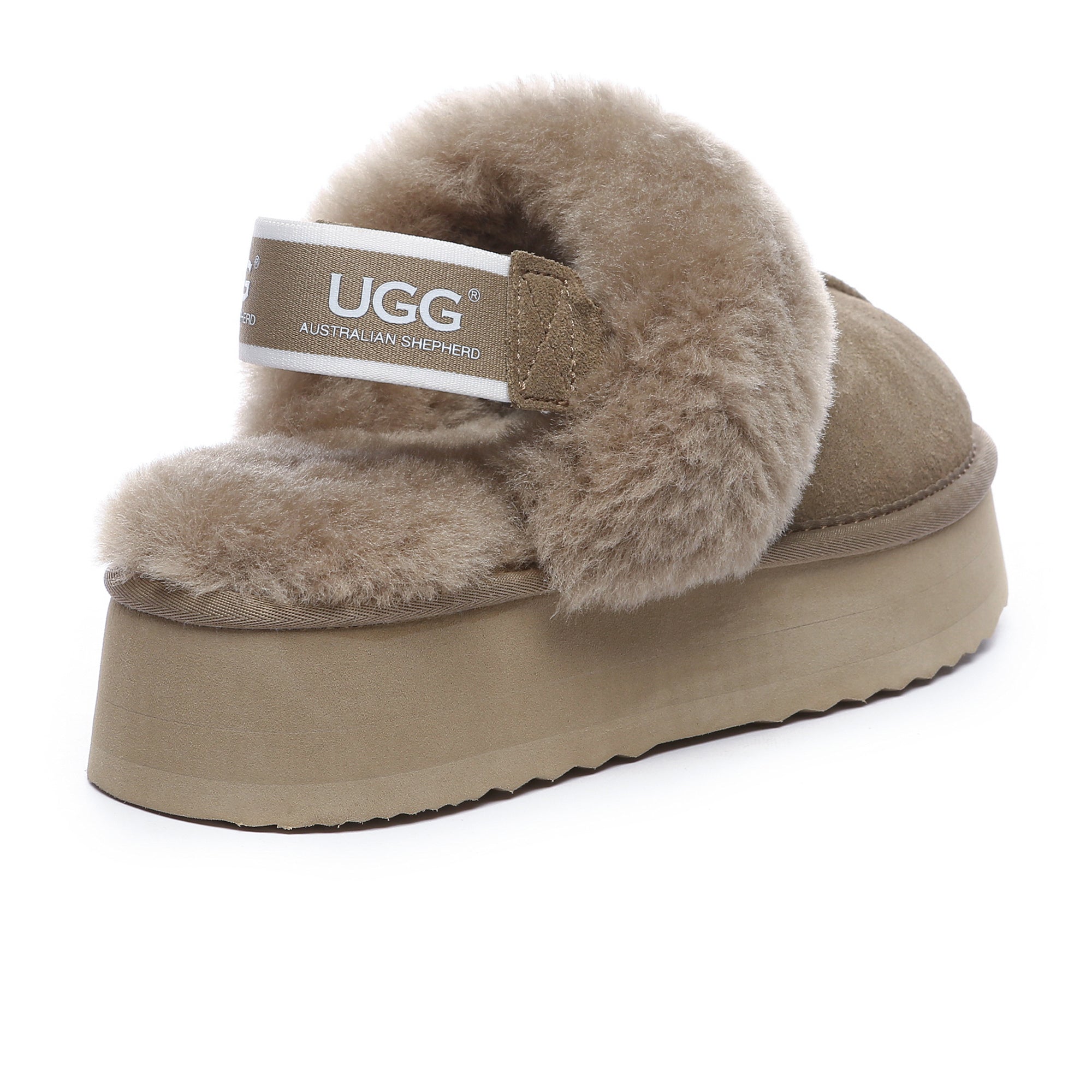 EverUgg Beta Platform UGG slippers with plush lining and thick platform soles, shown in a cozy indoor setting.
