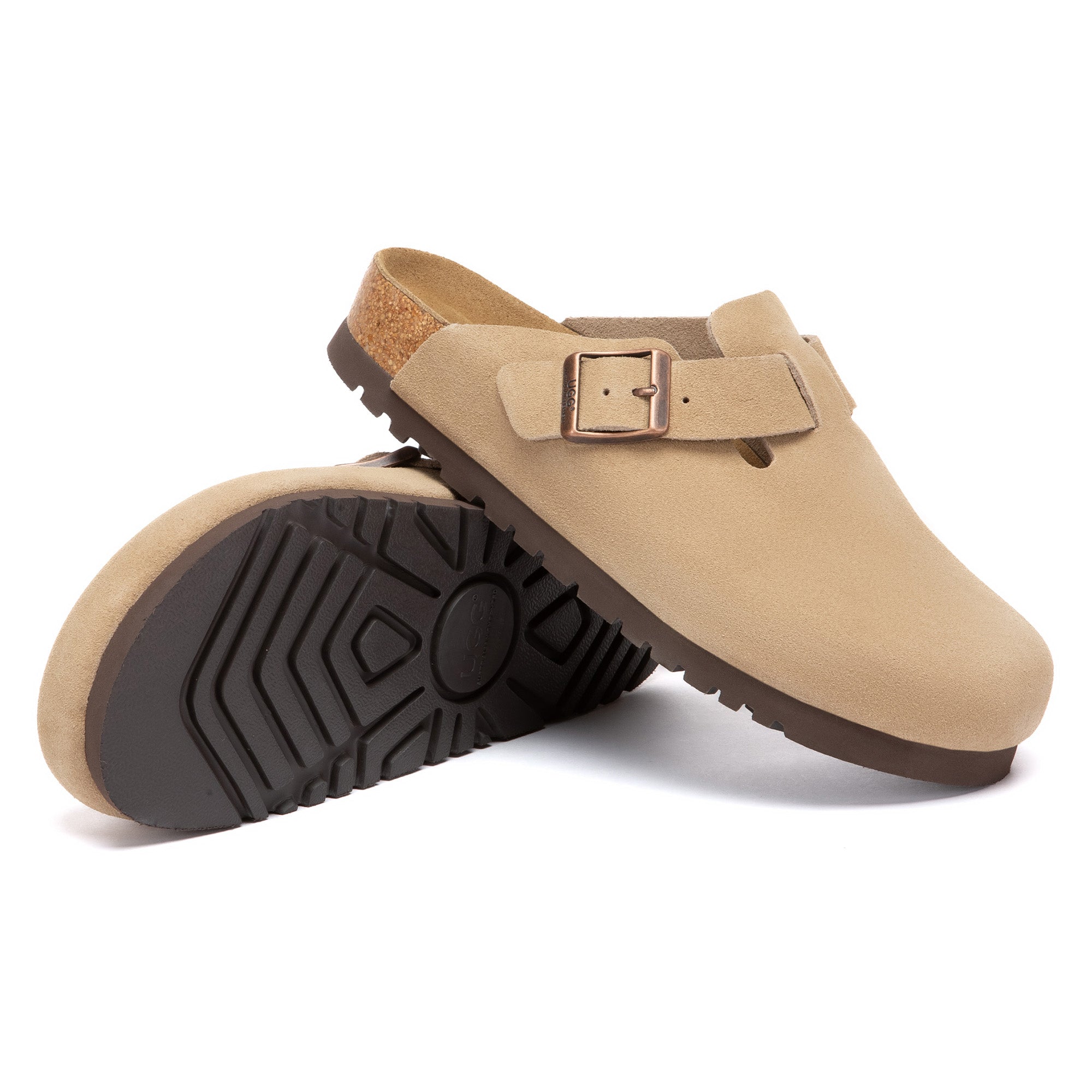 EverUgg Birkie Suede Buckle Clogs slippers with a cozy design and buckle detail, shown in a stylish indoor setting.