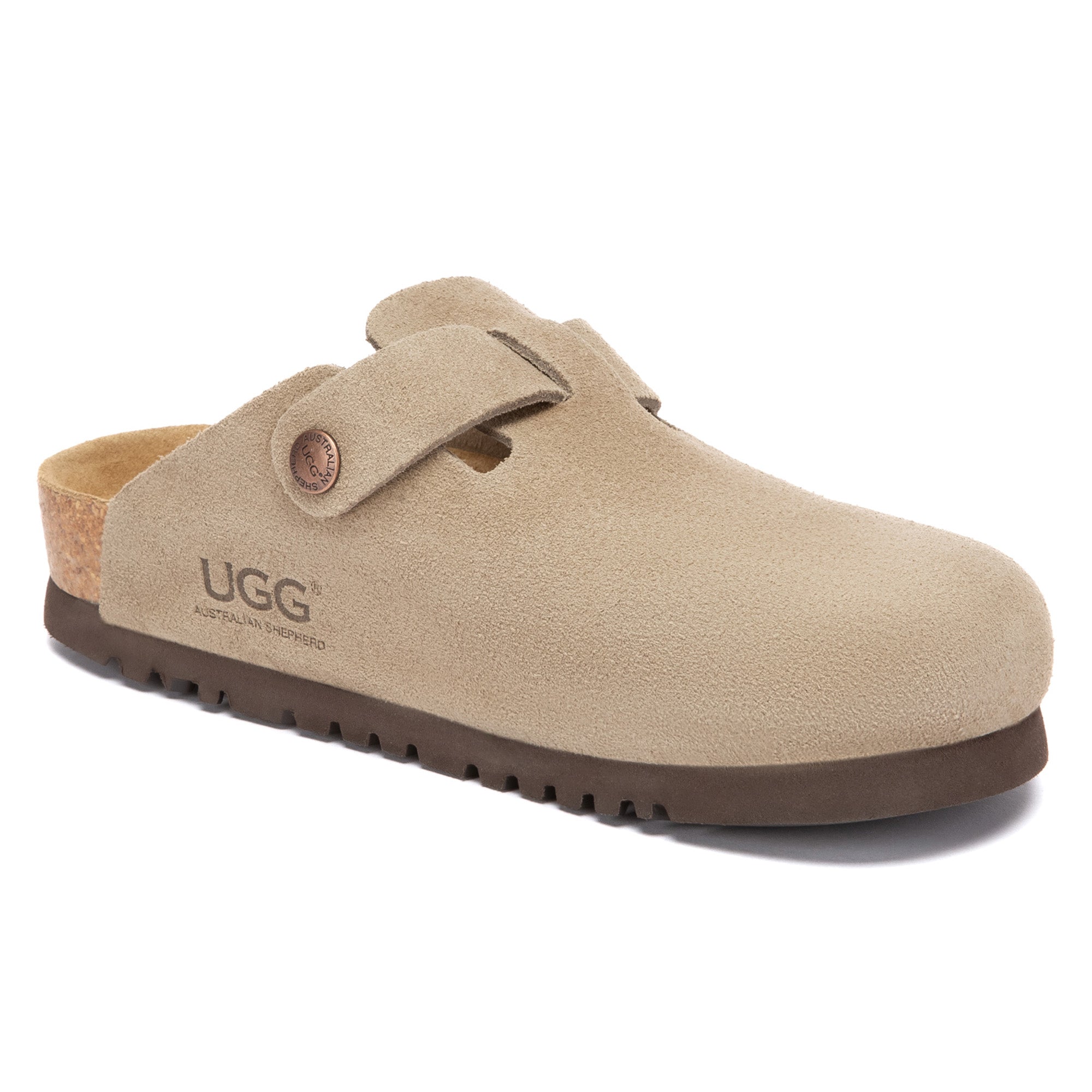 EverUgg Birkie Suede Buckle Clogs slippers with ankle buckle detail and cushioned soles, shown in a cozy indoor setting.