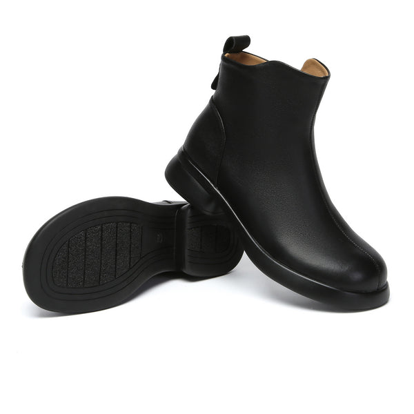 EverUgg Caroline Leather Zip Ankle Boots showing black leather material, side zipper, and stylish ankle-height design.
