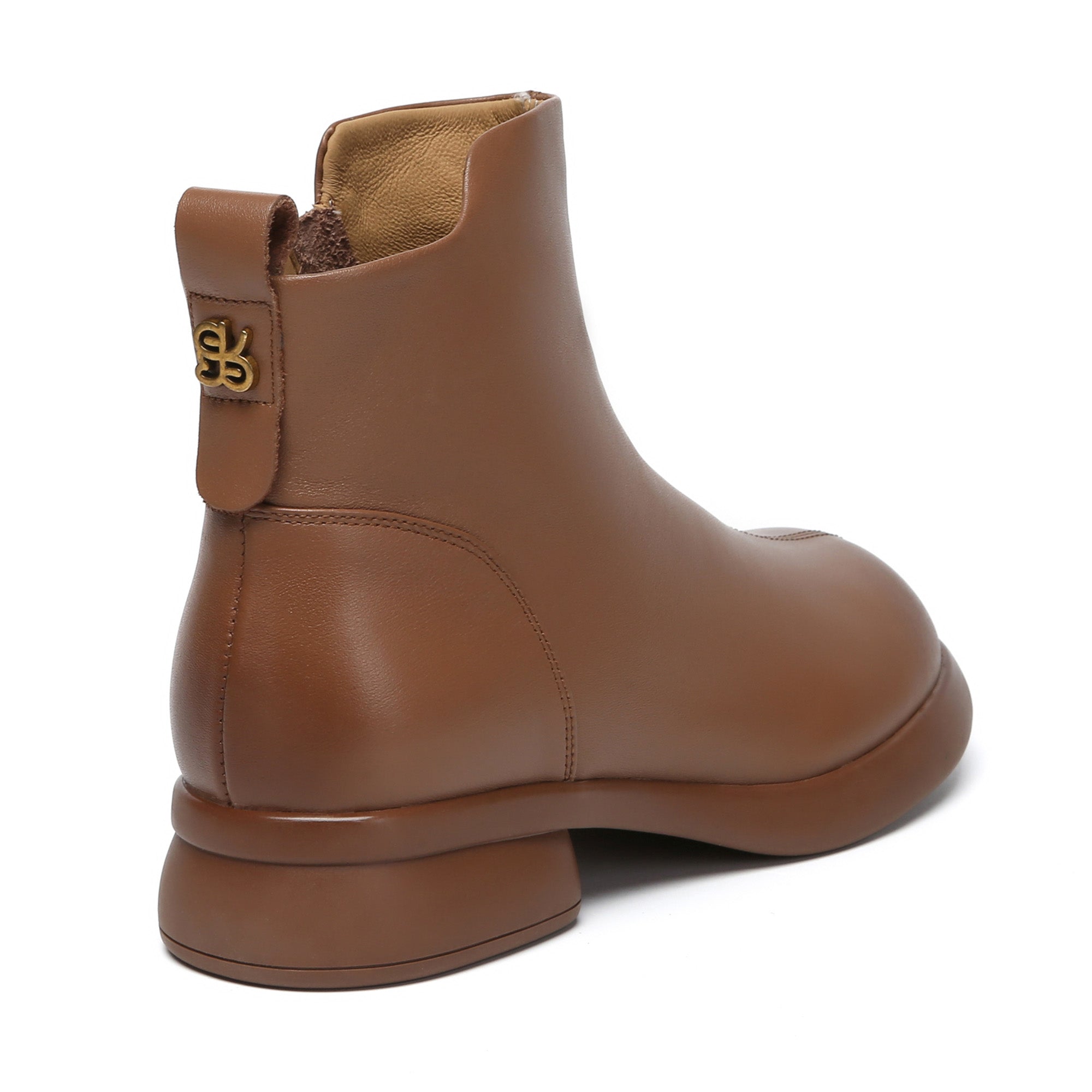 EverUgg Caroline leather zip ankle boots with sleek design and sturdy heels, perfect for stylish everyday wear.