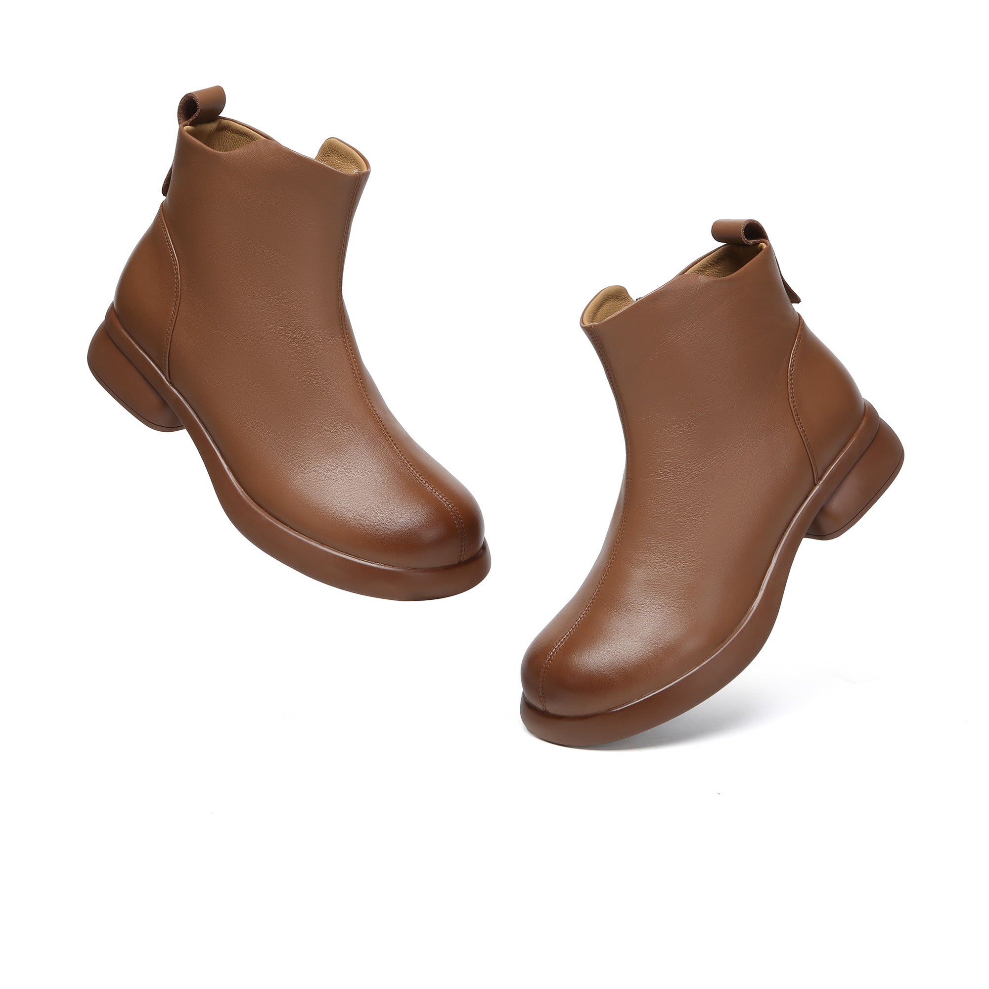 EverUgg Caroline leather zip ankle boots featuring sleek design and stylish ankle height, perfect for casual and dressy outfits.