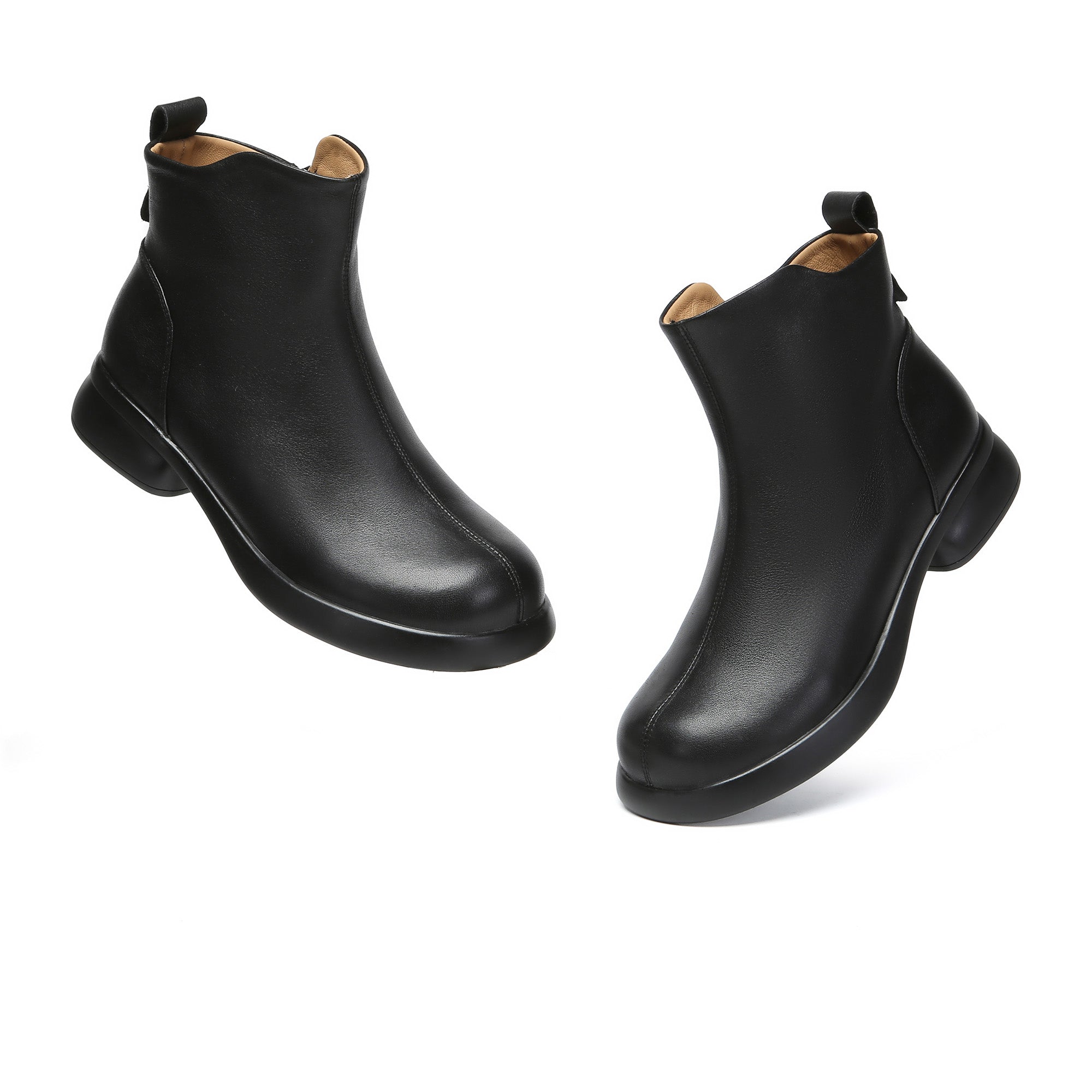 EverUgg Caroline Leather Zip Ankle Boots showing sleek leather design with side zipper and almond toe for stylish wear.