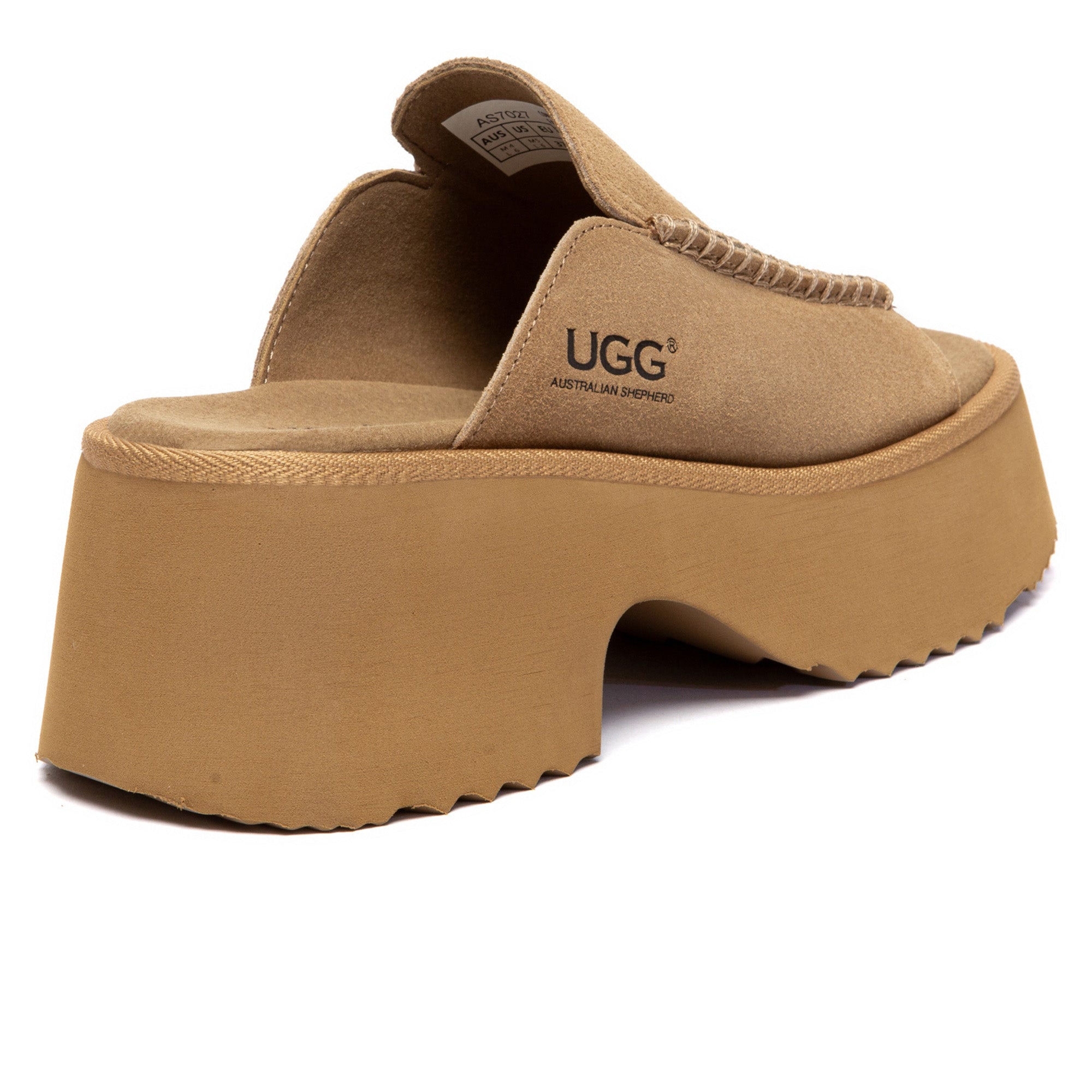 EverUgg chunky heel platform slippers with plush interior and beige slip-on design, featuring thick soles and stylish comfort.