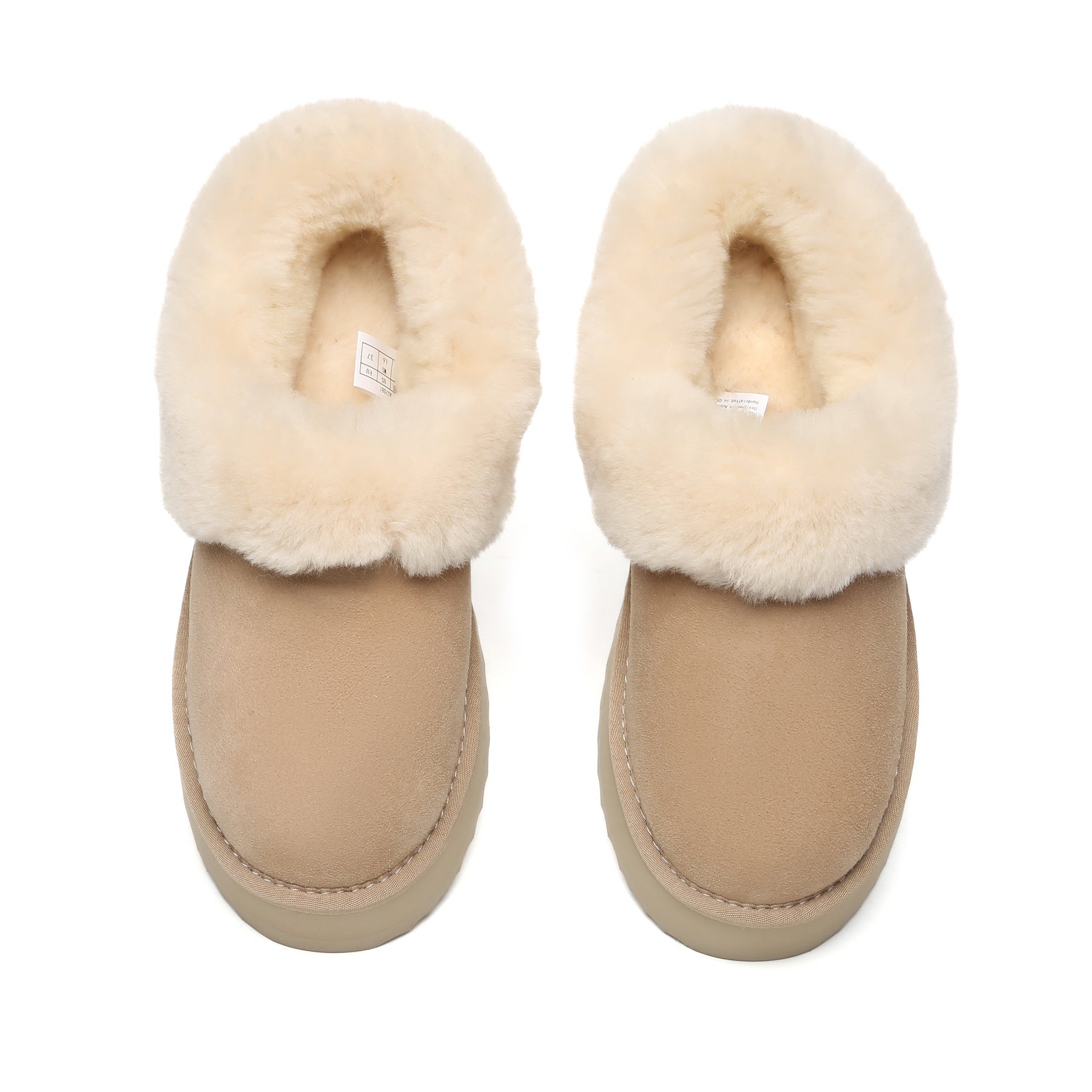 EverUgg Claire UGG platform ankle slippers with plush lining and beige suede exterior, designed for cozy comfort.