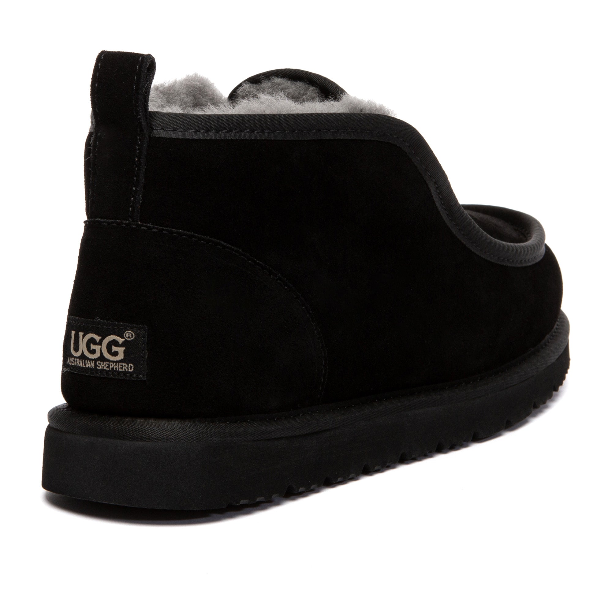 EverUgg Classic Mini Ankle UGG Boots in soft suede with plush fur lining, shown on a model's feet.