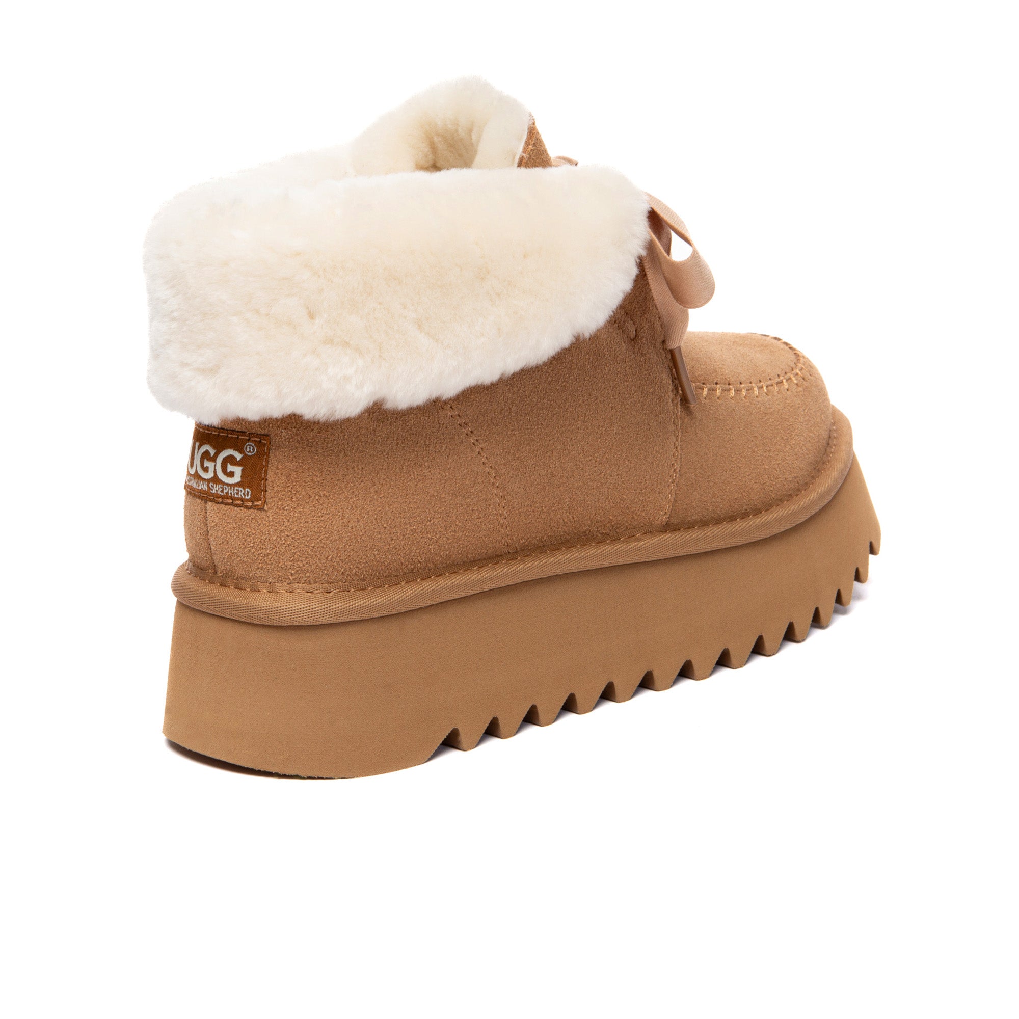 EverUgg cozy lace-up bow platform boots with plush interior and stylish design, perfect for cold weather wear.