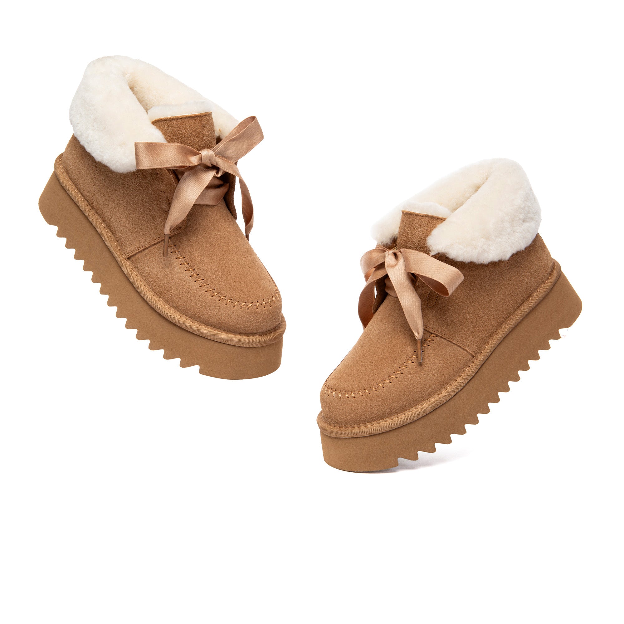 EverUgg cozy lace-up bow platform boots with plush lining and stylish design, featuring a lace-up front and platform sole.