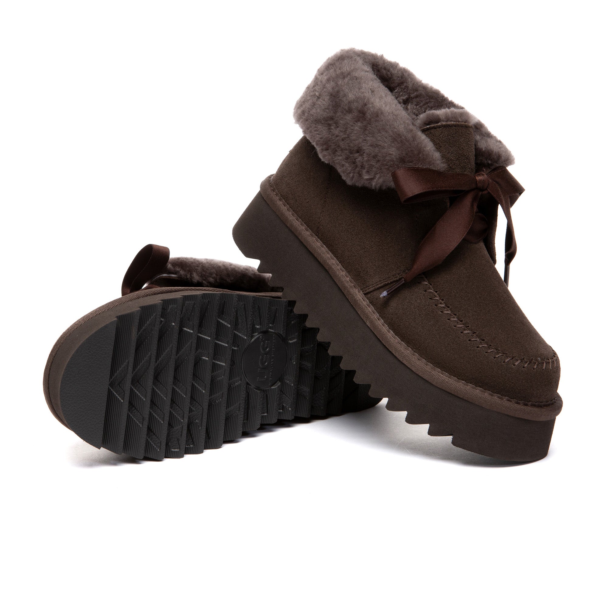 EverUgg cosy lace-up bow platform boots with plush lining and stylish design, perfect for winter footwear.