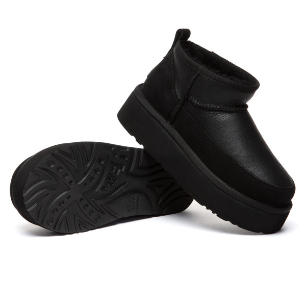 EverUgg Eralova Platform UGG Boots in tan with plush shearling lining and chunky sole, displayed on a neutral background.