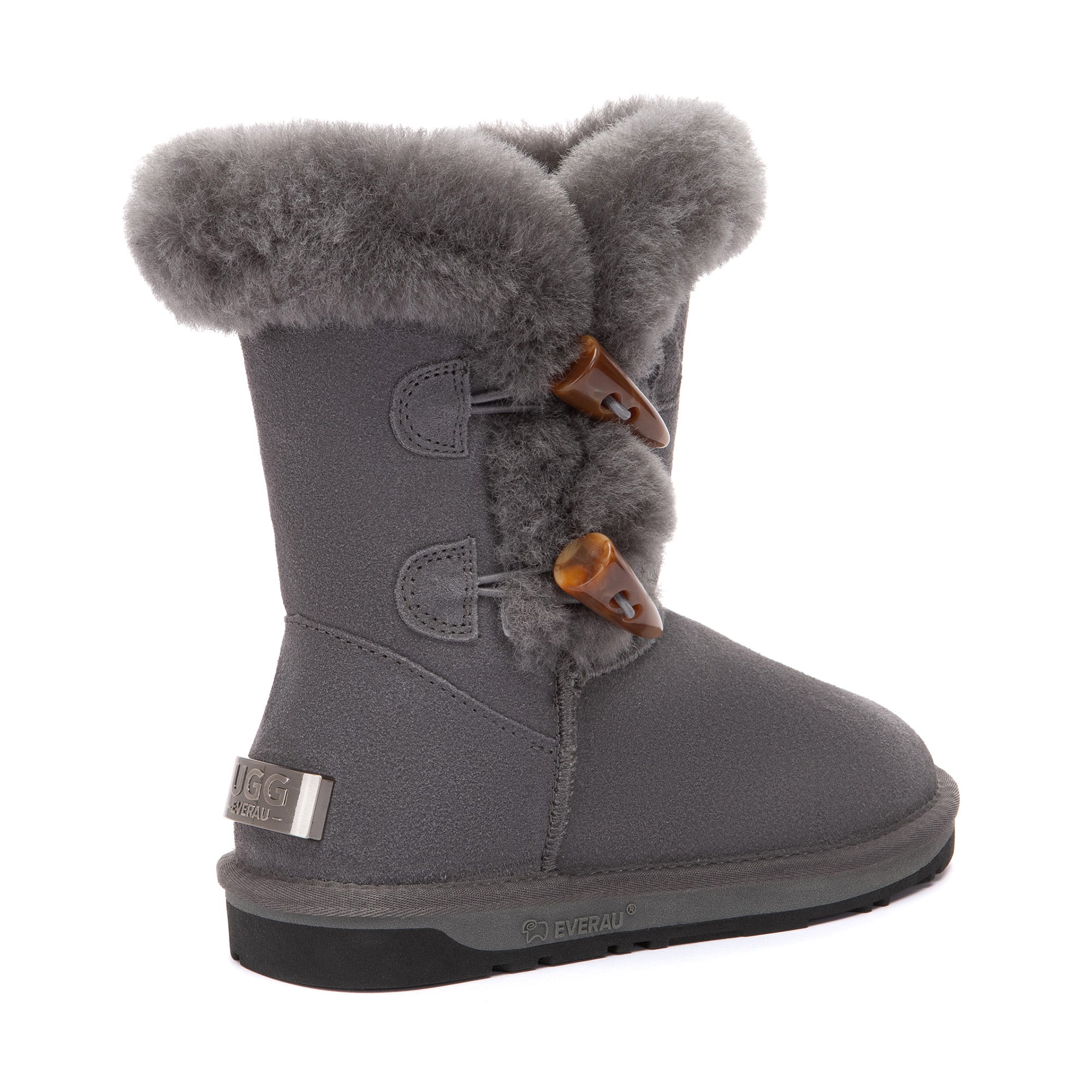 EverUgg Talia Shark 2-Button UGG Boots in tan with plush lining and decorative shark button detail on the side.