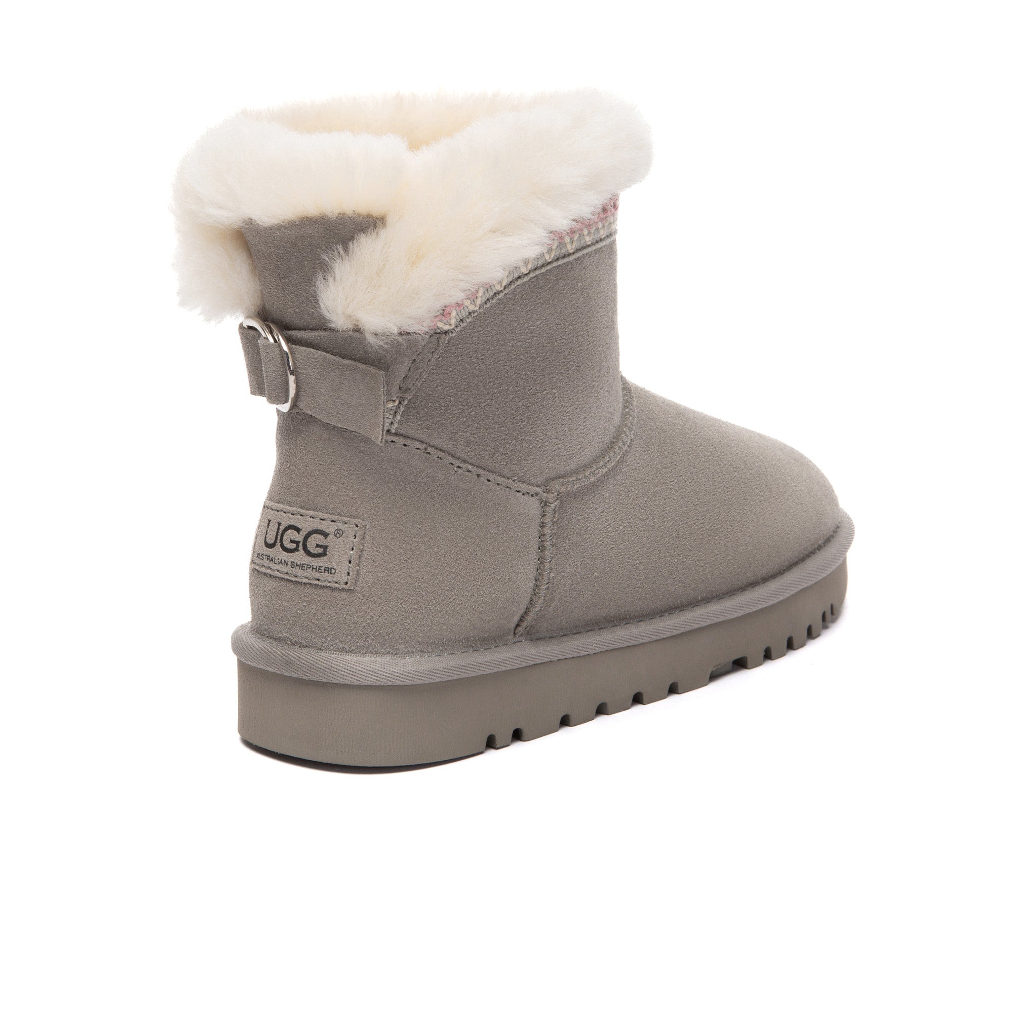 EverUgg Bohemian Classic Mini UGG Boots in tan with cozy sheepskin lining and decorative stitching, displayed on a white background.