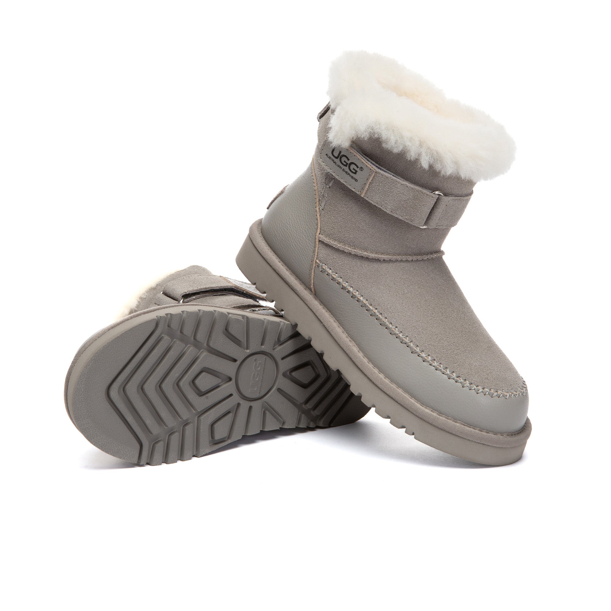 EverUgg buckle strap fashion UGG boots with stylish detailing and cozy design, shown in a close-up image.