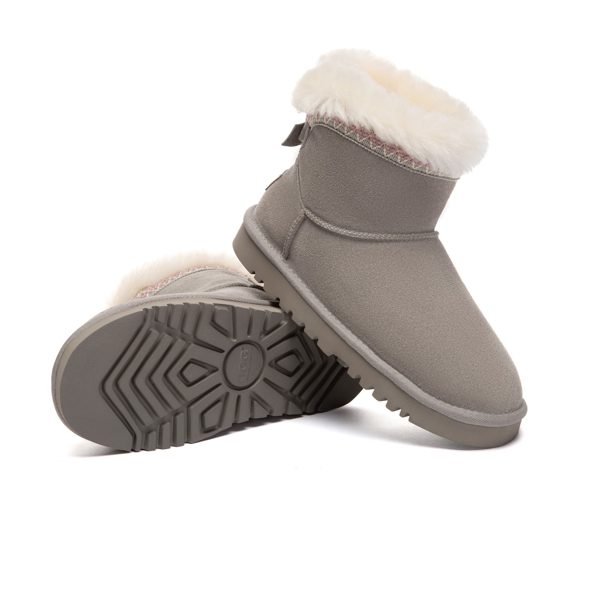 EverUgg Bohemian Classic Mini UGG Boots in tan, showcasing cozy sheepskin lining and stylish ankle-height design.