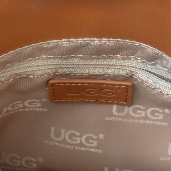 EverUgg Kenny Fluffy Adjustable Strap UGG Backpack, soft plush handbag with adjustable straps and spacious interior.