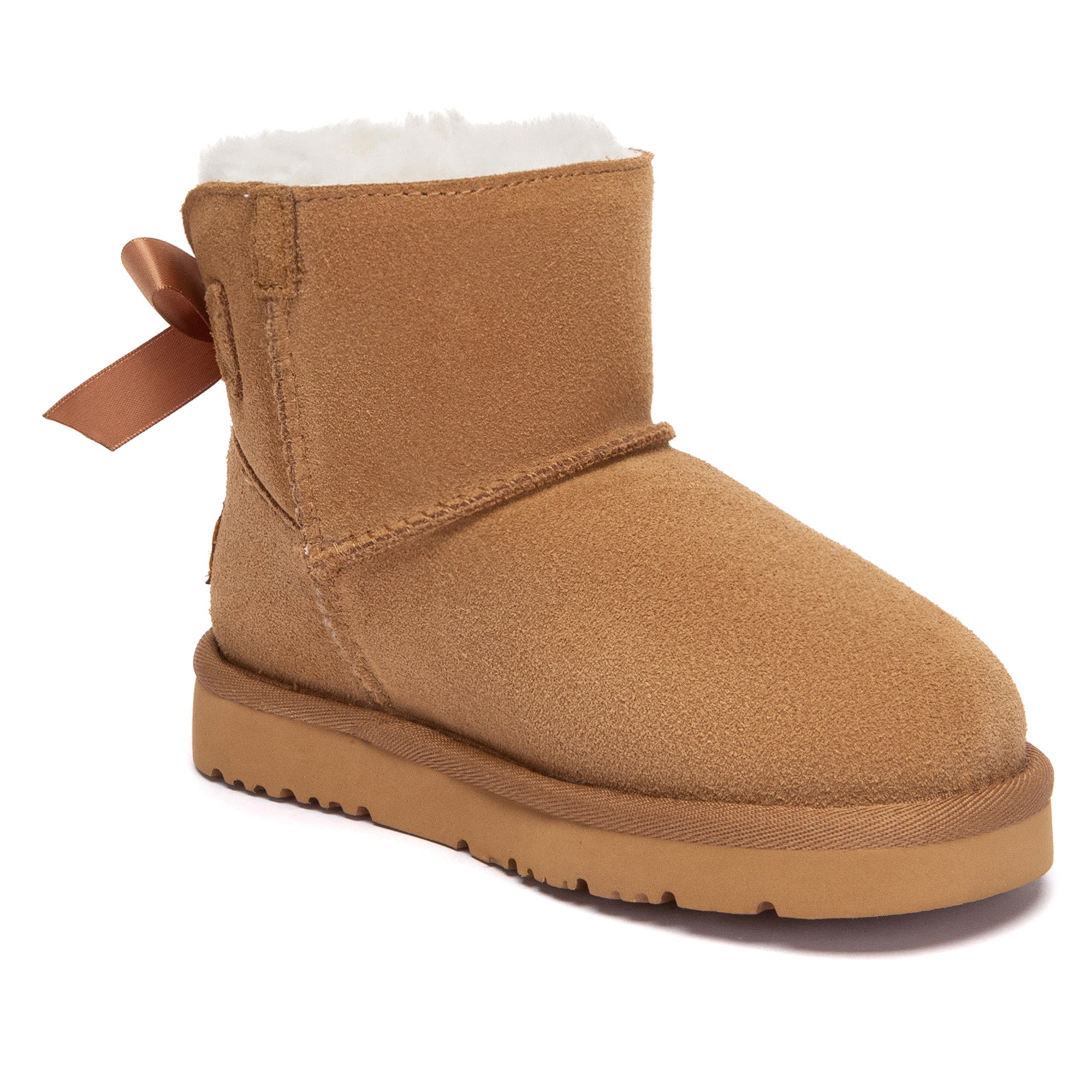Kids mini UGG boots by EverUgg with classic back bow, soft suede exterior, and cozy lining for cold weather comfort.