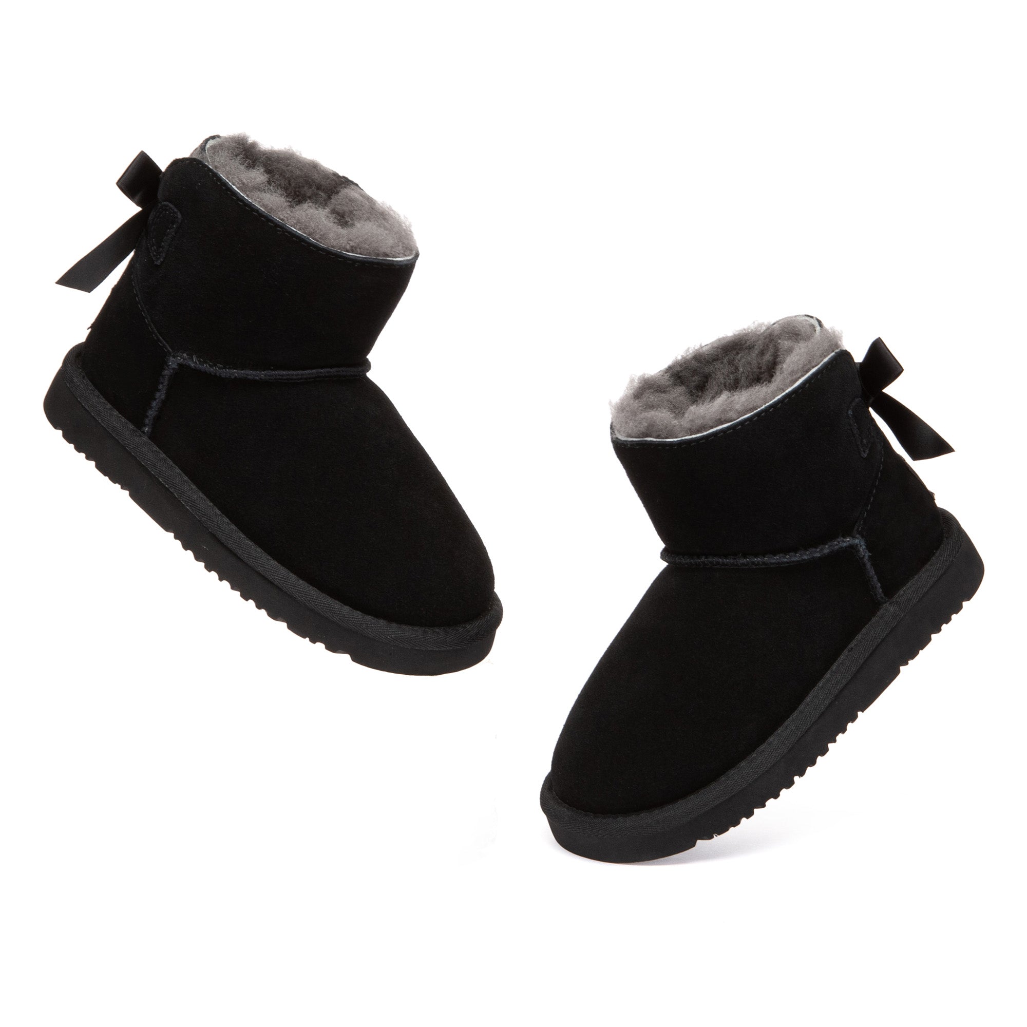 Kids mini UGG boots with classic back bow design in soft plush material, featuring the EverUgg brand logo.