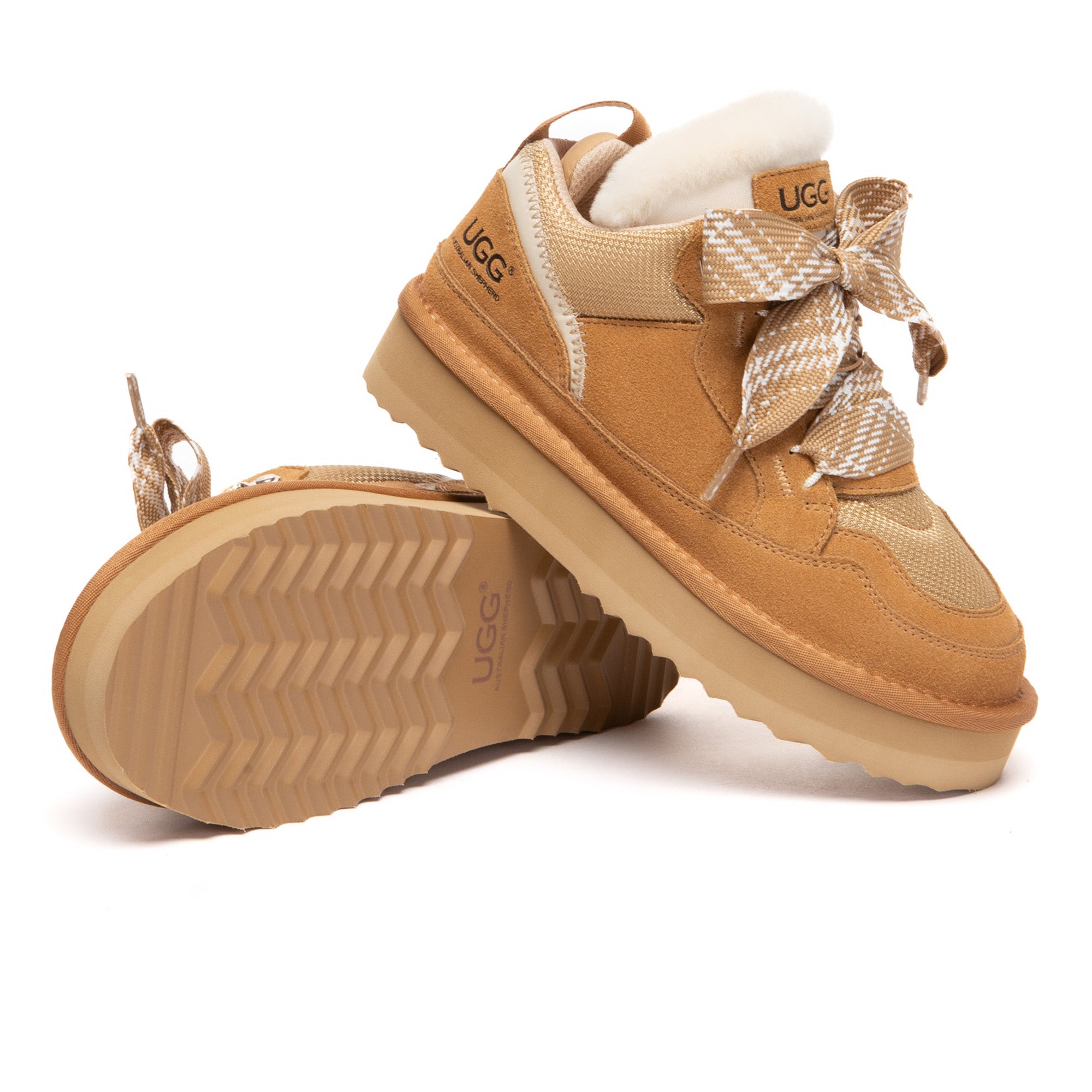 Kids UGG platform lace-up boots by EverUgg, featuring a stylish design and durable construction for young wearers.