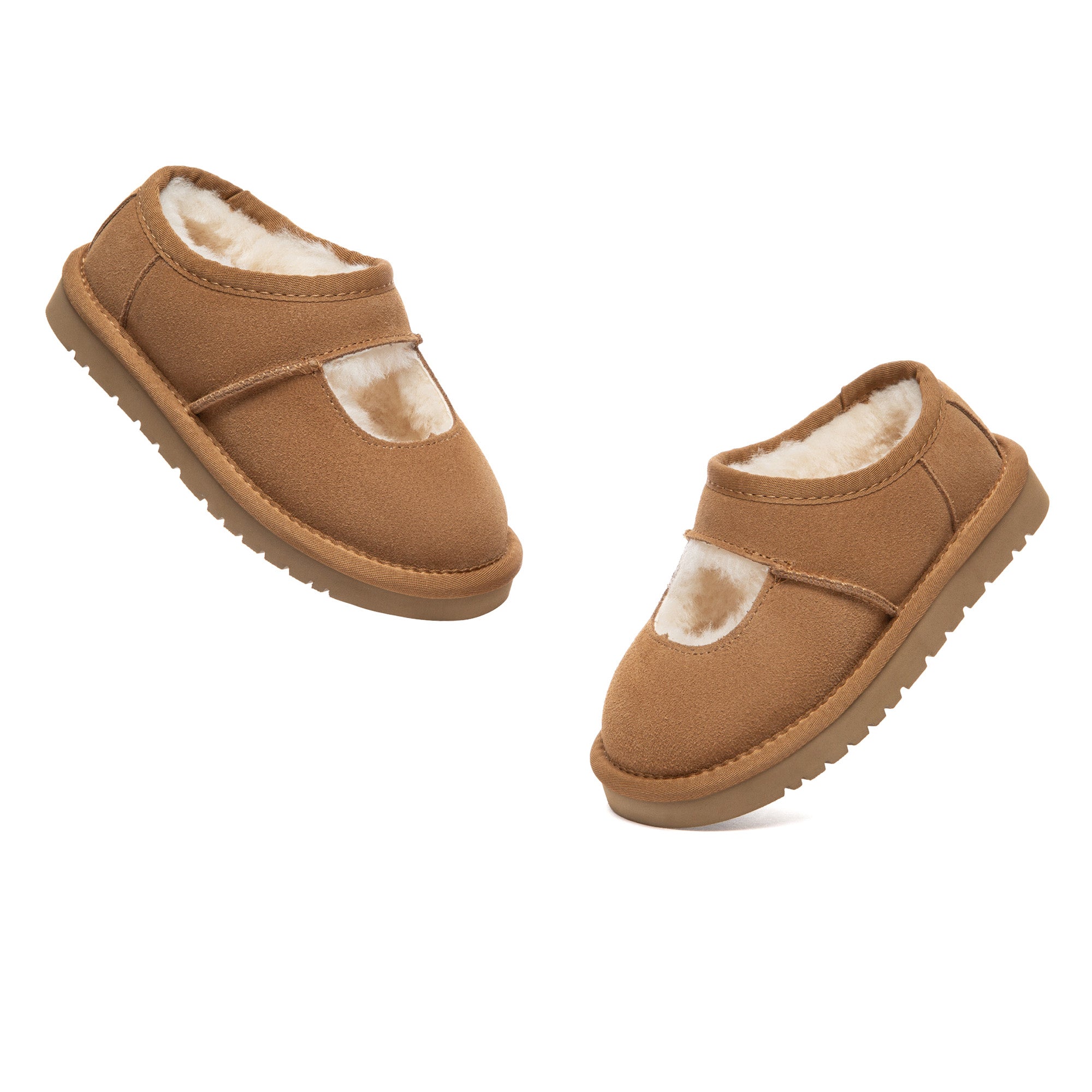 Kids Reveal UGG platform slippers in soft plush material with thick soles, designed for comfort and style.
