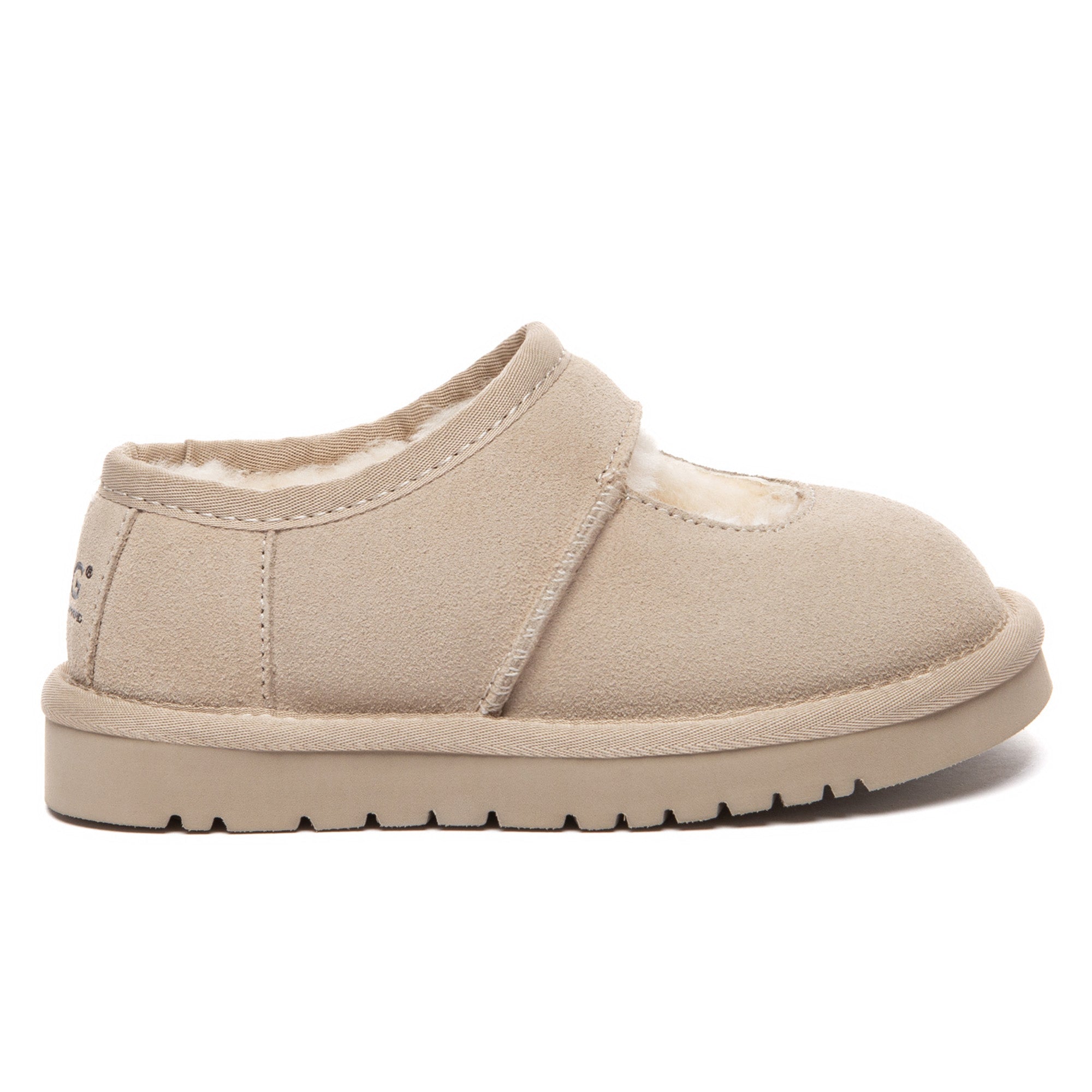 Kids Reveal UGG platform slippers with soft plush lining and slip-on design, featuring a stylish UGG logo on the side.