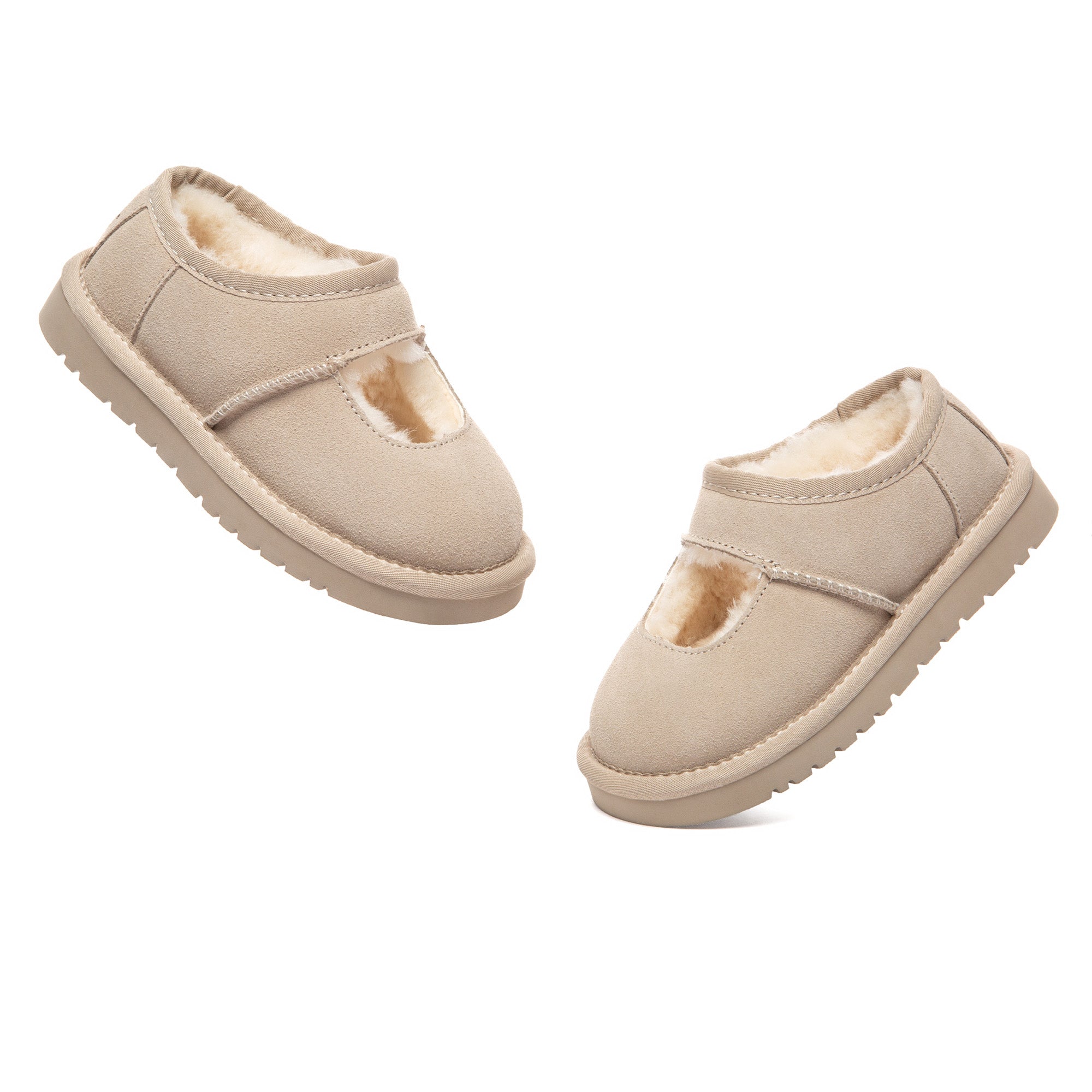 Kids Reveal UGG platform slippers by EverUgg featuring soft plush material and chunky platform sole, ideal for comfortable indoor wear.