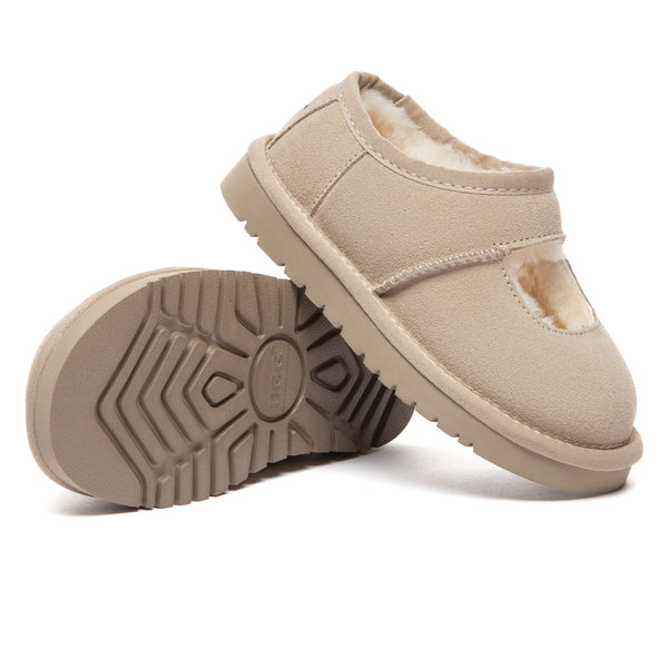 Kids reveal UGG platform slippers by EverUgg featuring soft material, cozy design, and a stylish platform sole for comfort and style.