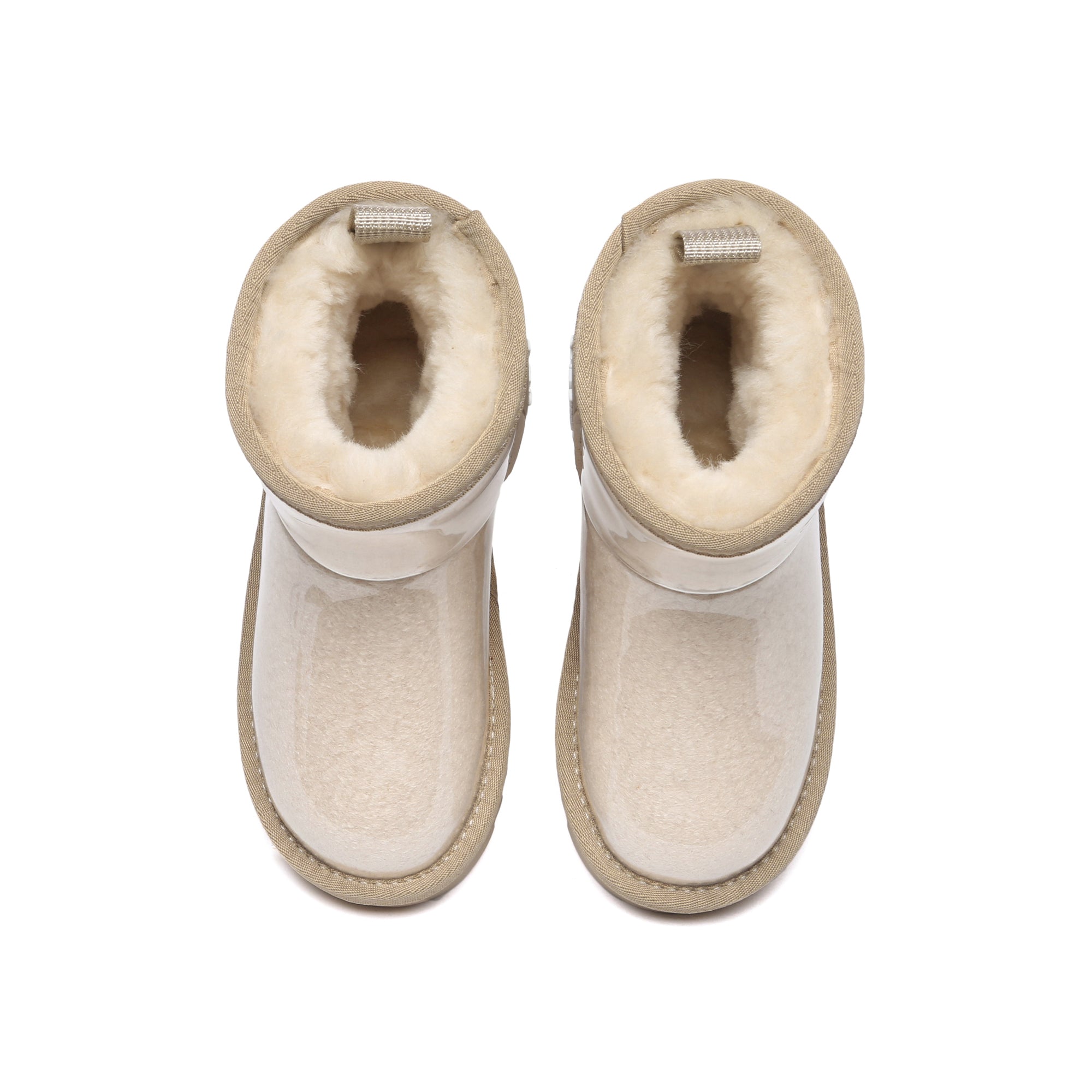 Kids waterproof UGG boots by EverUgg in cream, featuring cozy shearling lining and durable waterproof exterior.