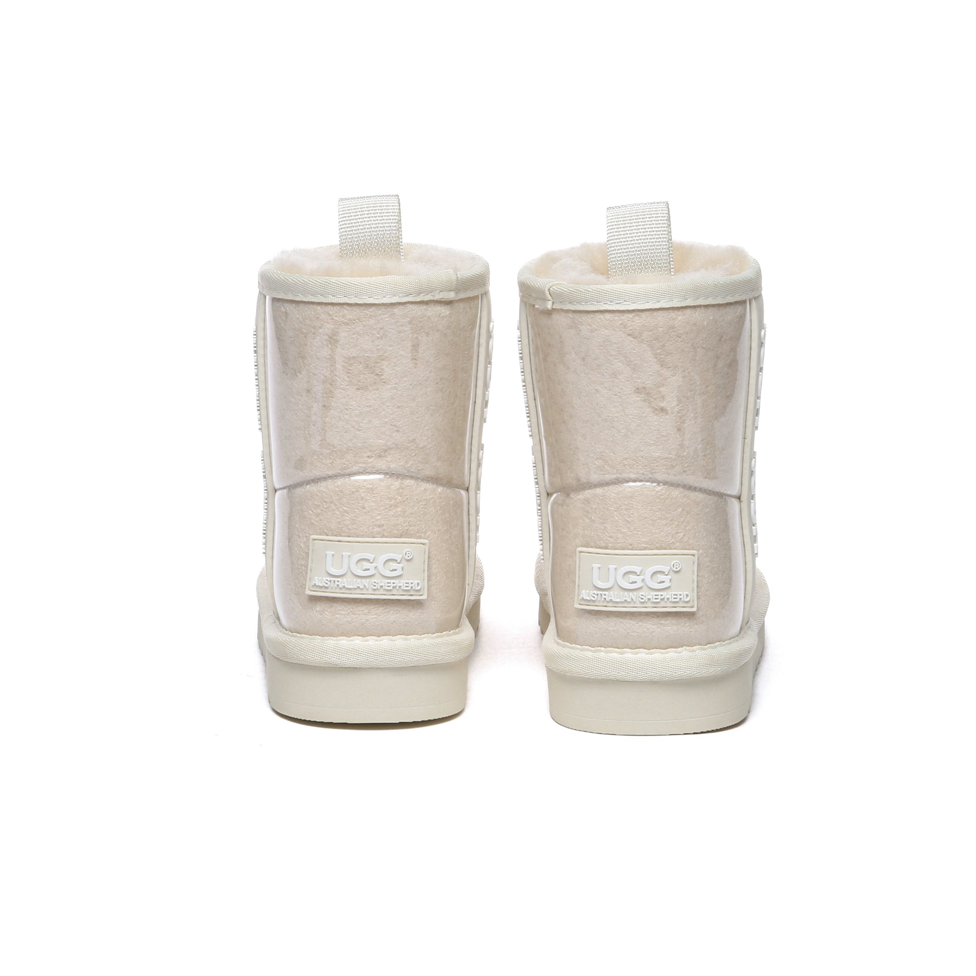 Kids waterproof EverUgg boots in cream milk color, featuring cozy sheepskin lining and durable rubber soles for winter wear.