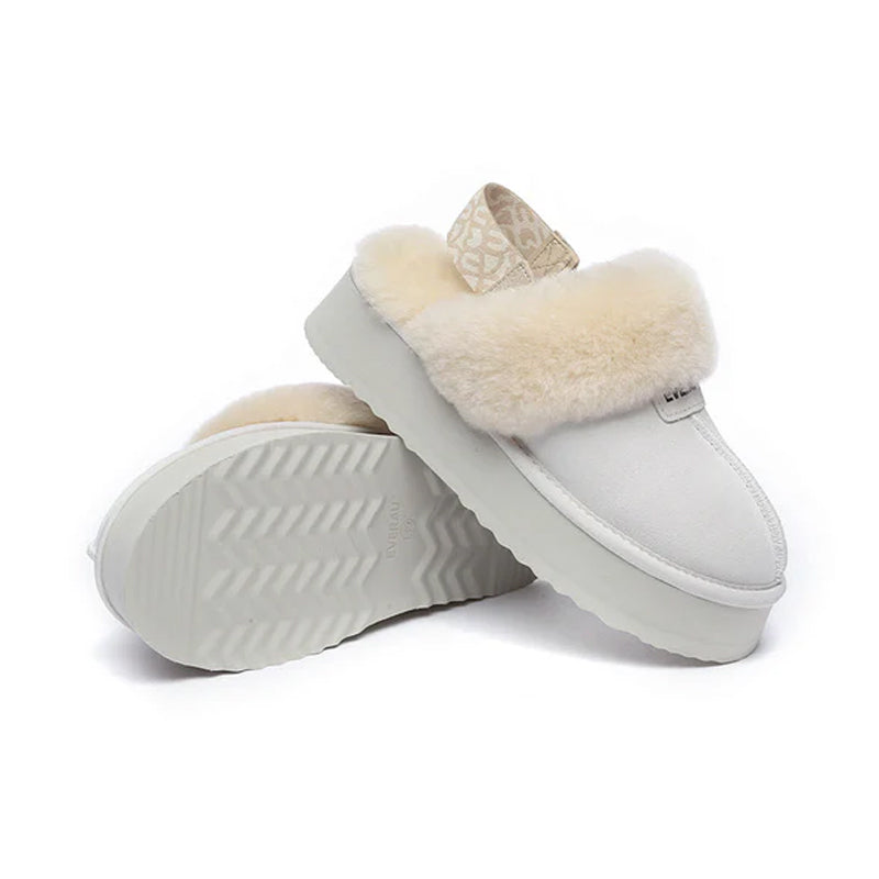 EverUgg Kirra Platform UGG slippers in white, showcasing the cozy slip-on design with a thick platform sole.