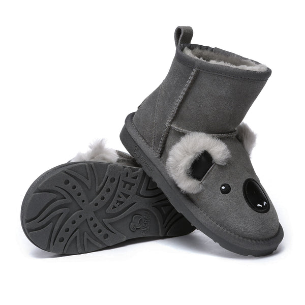 Kids UGG boots by EverUgg featuring cozy wool lining and brown suede exterior, designed for children’s comfort and style.