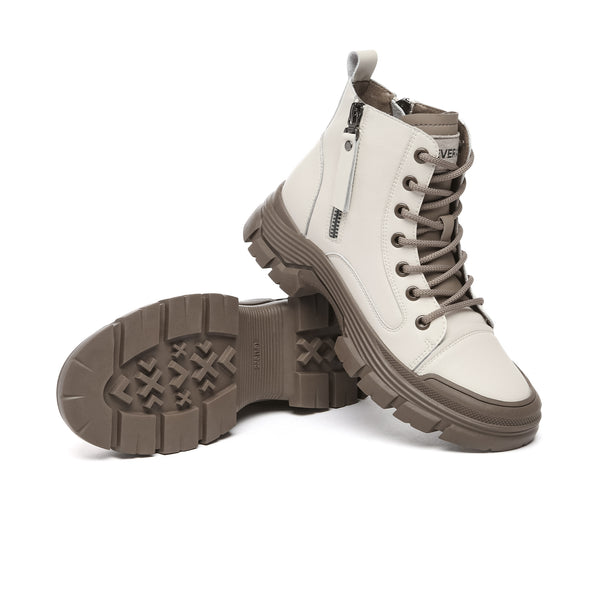 EverUgg leather chunky ankle boots for women with rugged sole and stylish design, showcasing their ankle-high silhouette and textured leather.