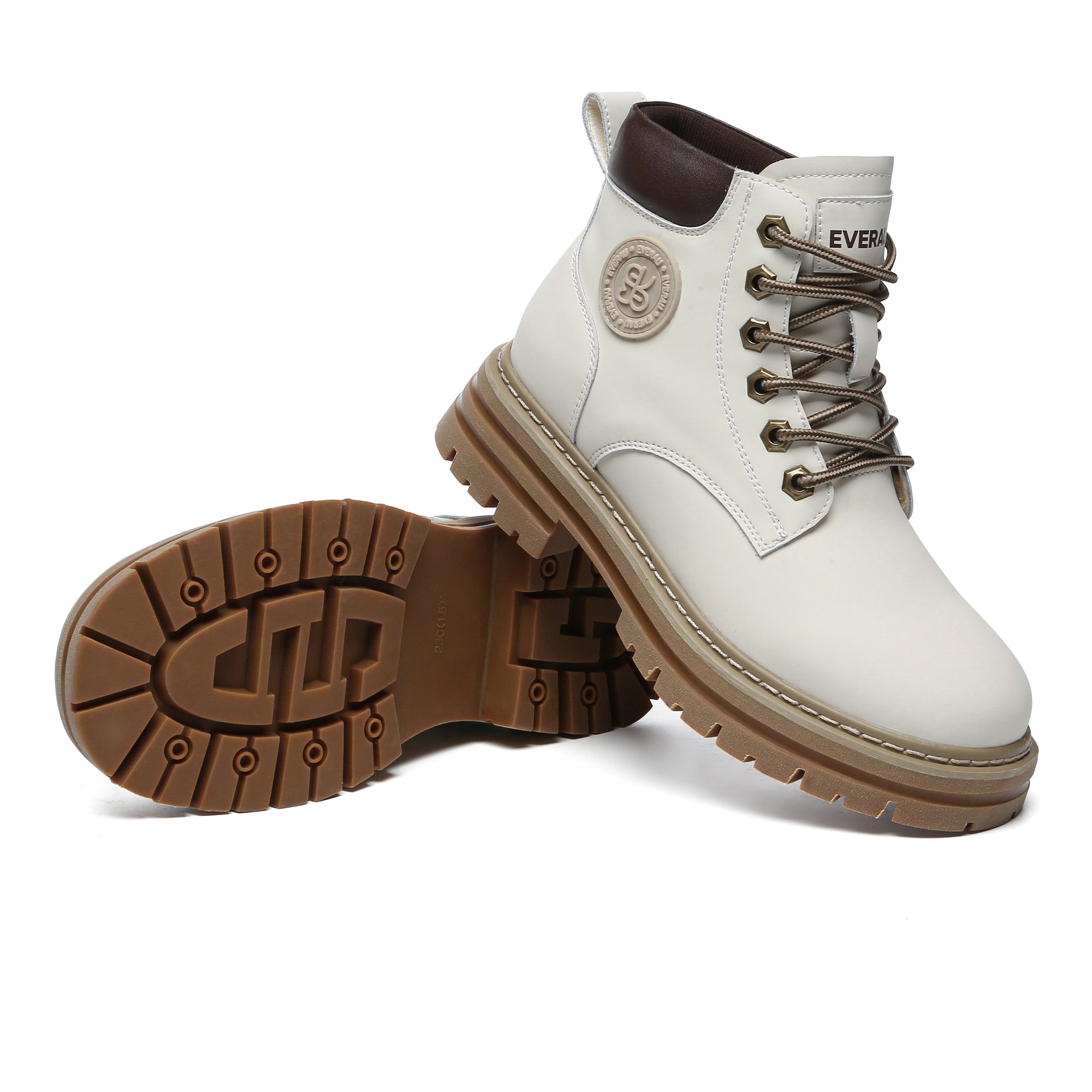 Women's leather high top Timber boots by EverUgg featuring rugged design and ankle-high style in a natural outdoor setting.