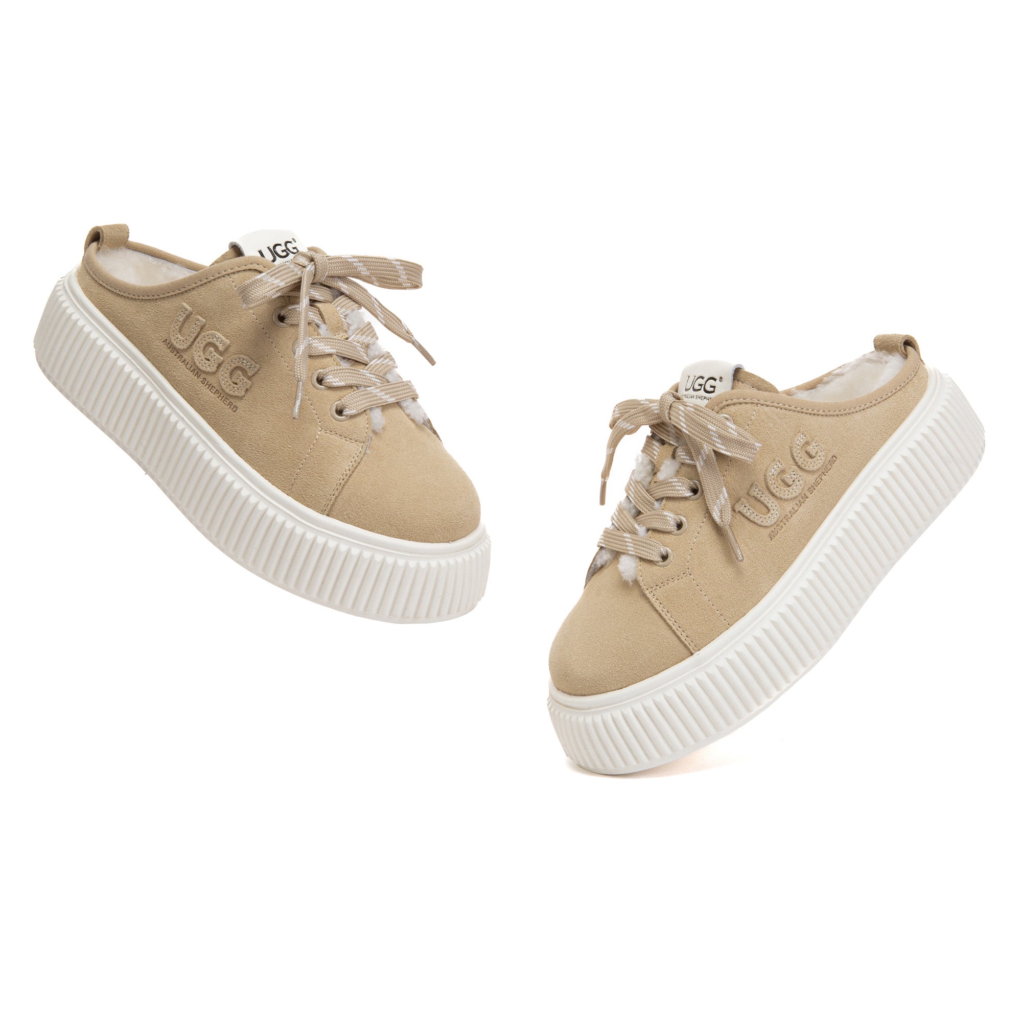 EverUgg Lorne Mules Platform Slides showing beige slip-on shoes with chunky sole and UGG branding, casual and comfortable footwear.