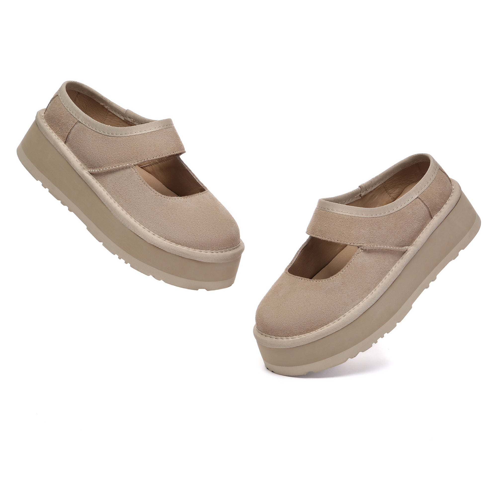 EverUgg Mary Jane platform slippers with rounded toe and ankle strap, featuring a textured sole and plush interior.