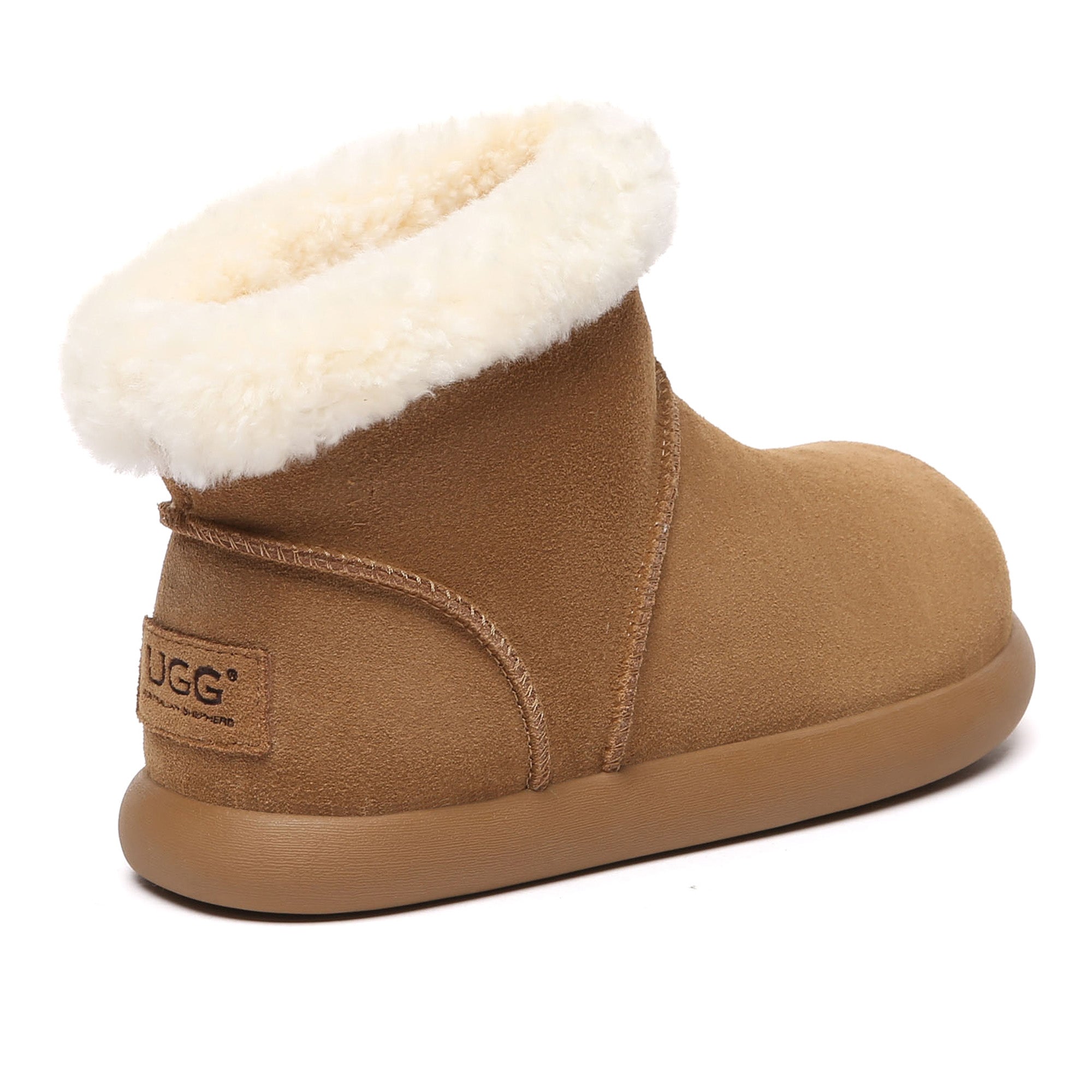 EverUgg Mini Ankle Classic UGG Boots in tan, showing the cozy shearling lining and sleek leather exterior.