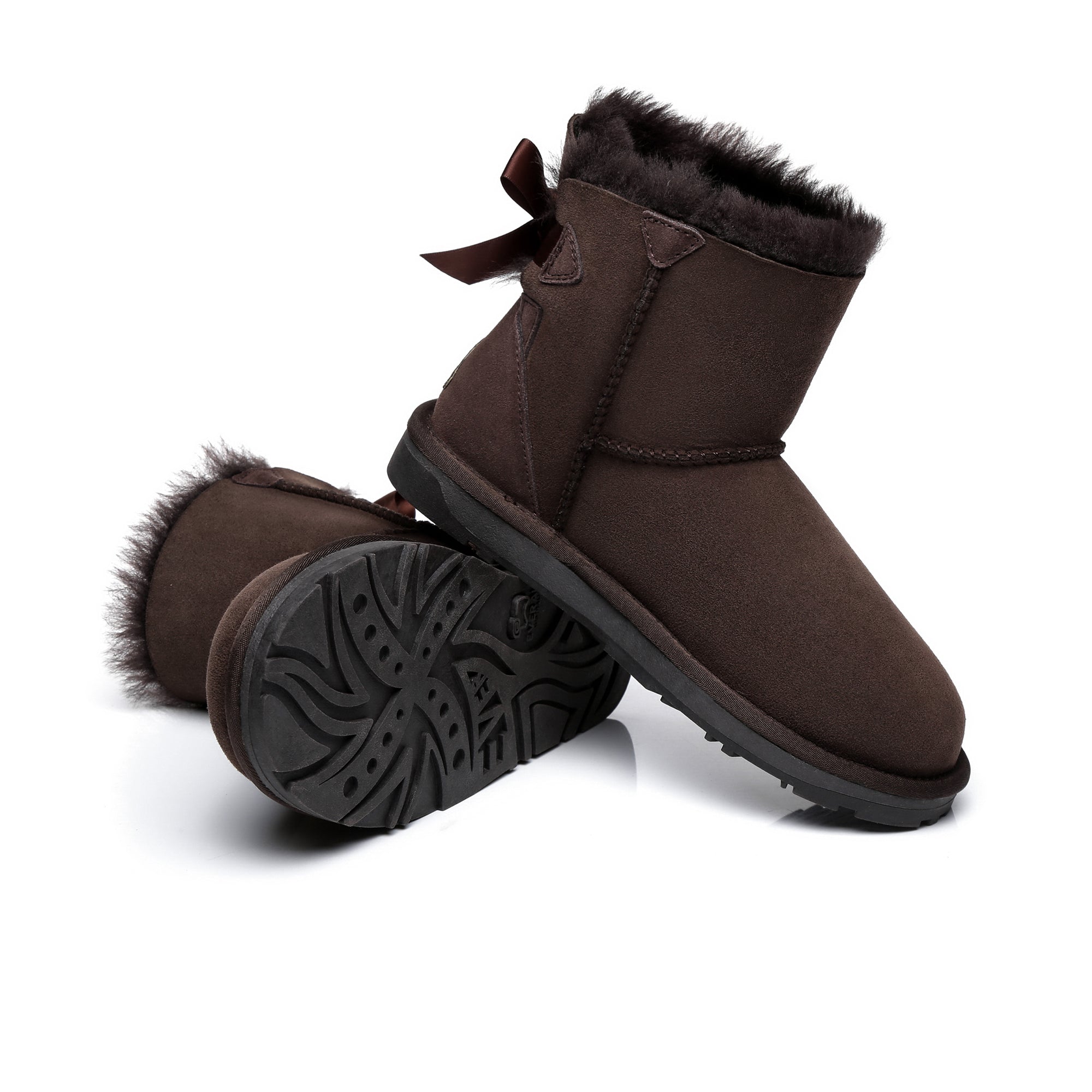 EverUgg Mini Back Bow UGG Boots showing beige suede exterior with small rear bow detail and cozy fur lining.