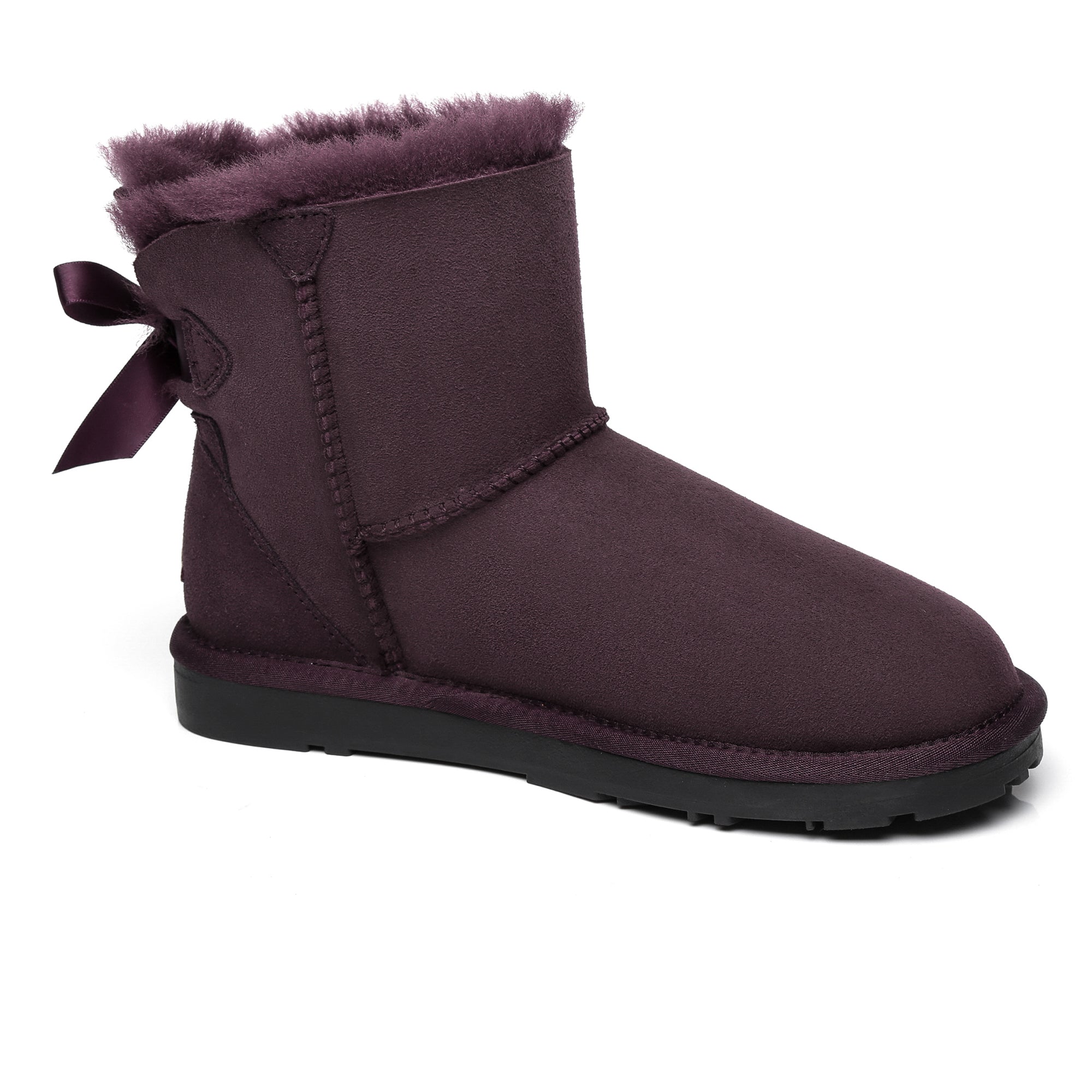 EverUgg Mini Back Bow UGG Boots featuring a stylish back bow design and cozy suede material for winter wear.