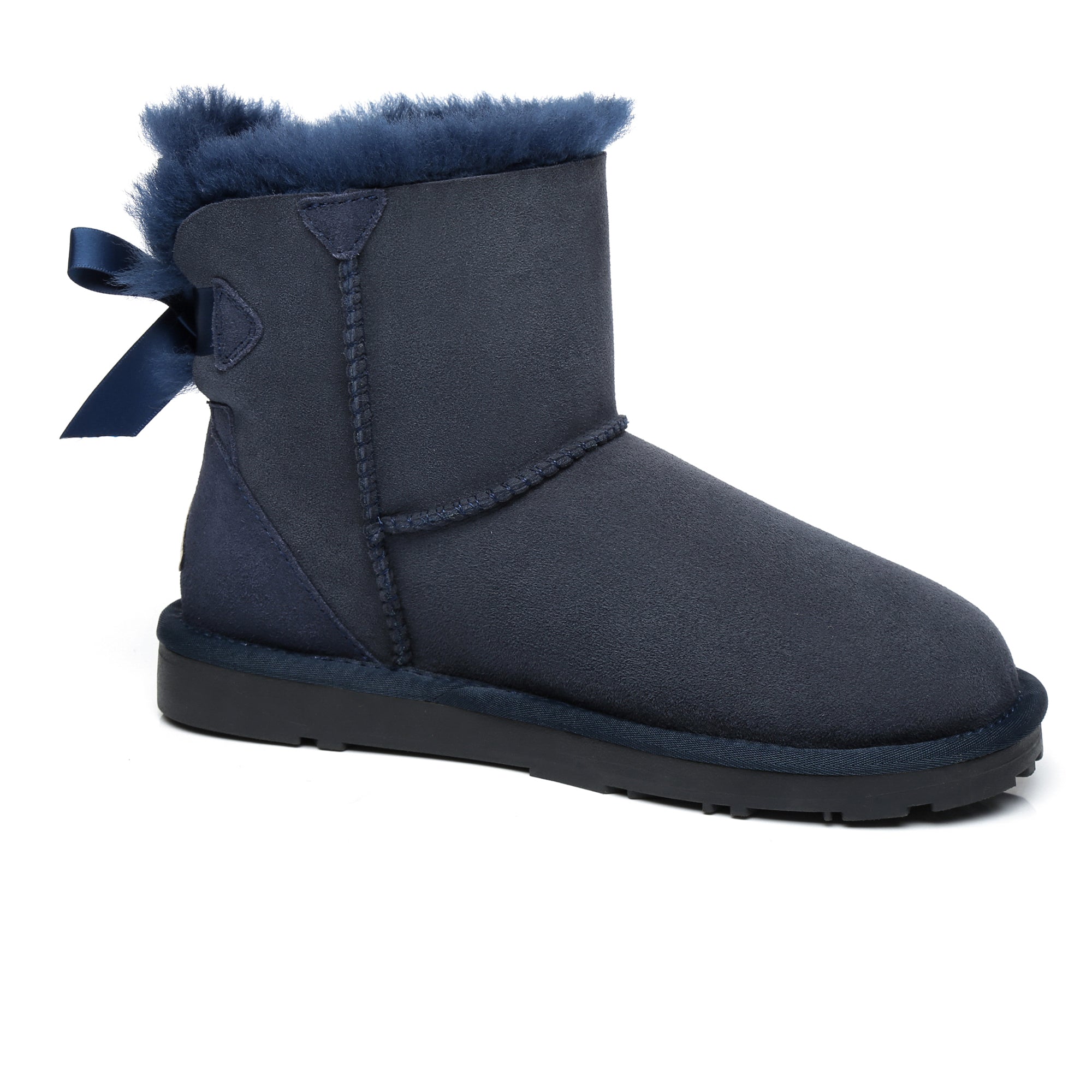 EverUgg Mini Back Bow UGG Boots featuring a stylish back bow design and cozy sheepskin lining.
