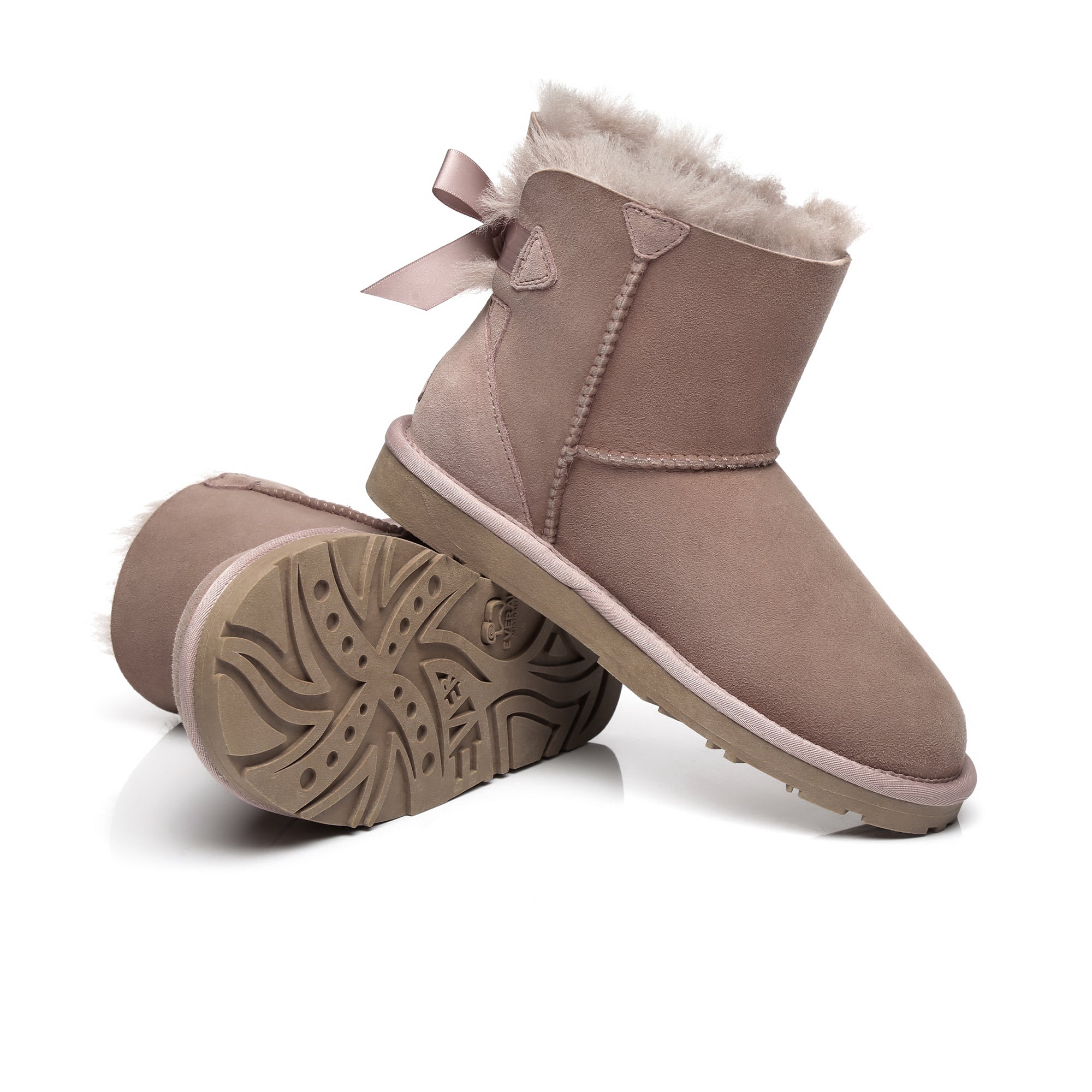 EverUgg Mini Back Bow UGG Boots featuring a stylish back bow design and classic sheepskin material.