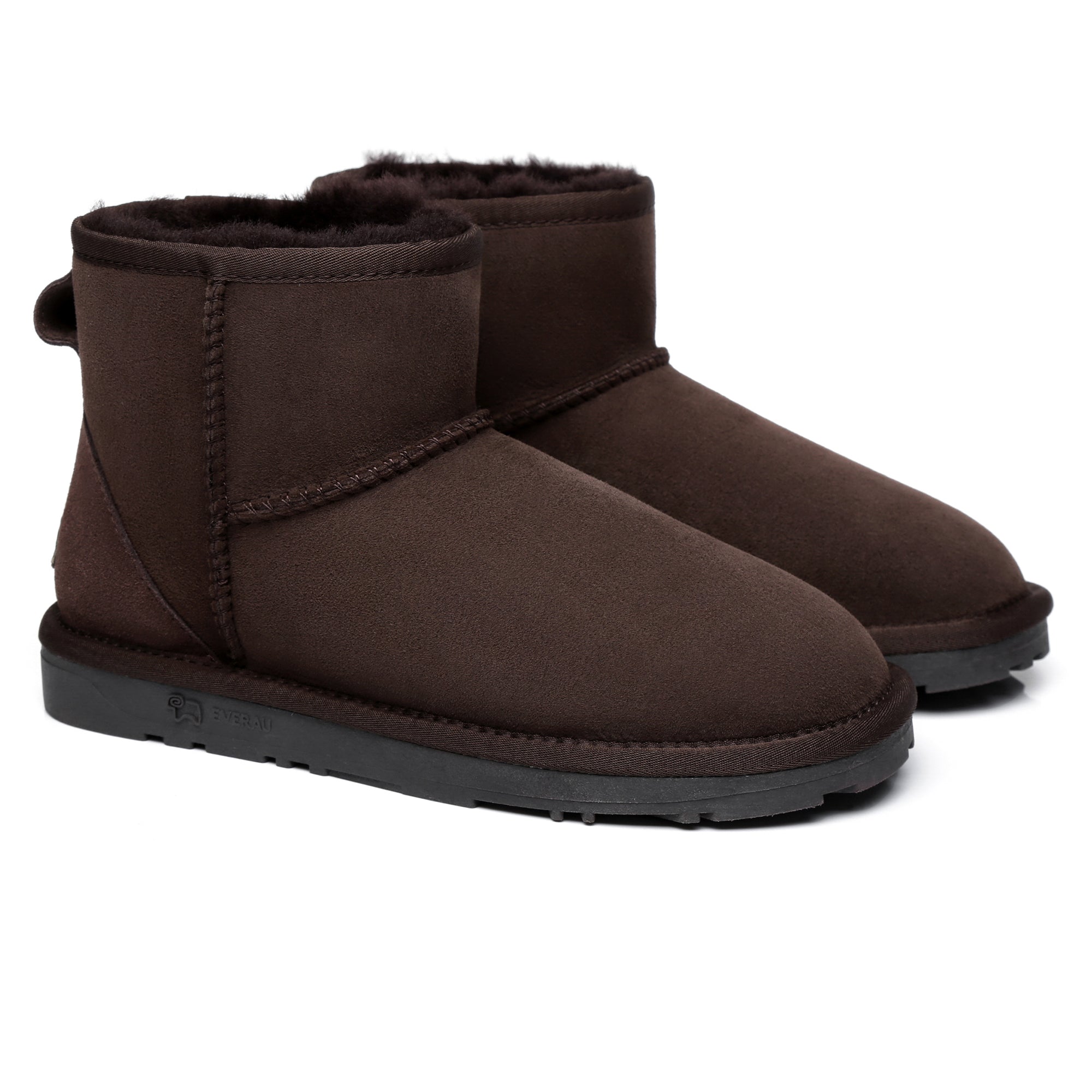 EverUgg Mini Classic Sheepskin UGG Boots for women, featuring soft sheepskin and iconic design, shown in a cozy, casual setting.