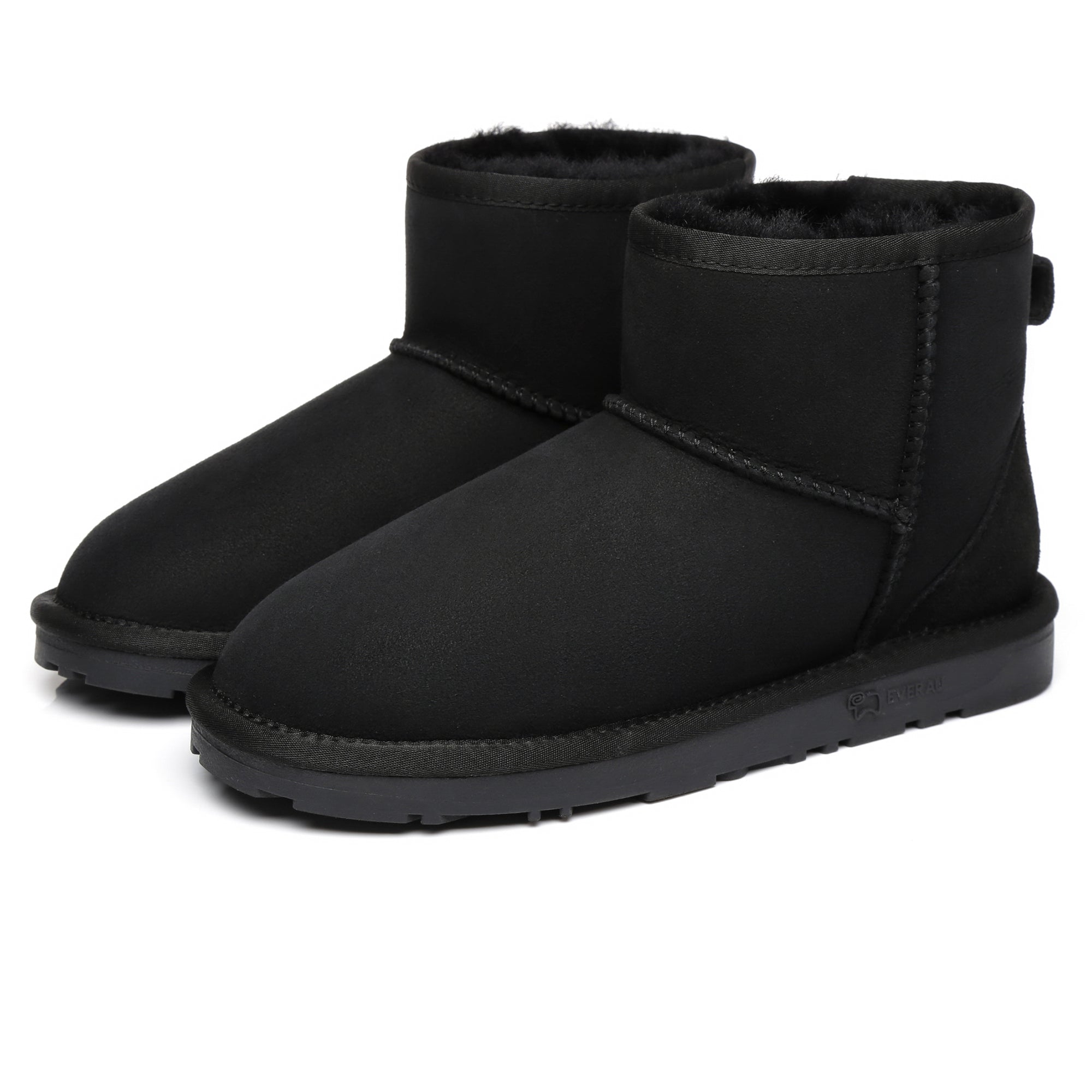 EverUgg Mini Classic Sheepskin UGG Boots for women, showcasing cozy beige boots with sheepskin lining and rubber soles.