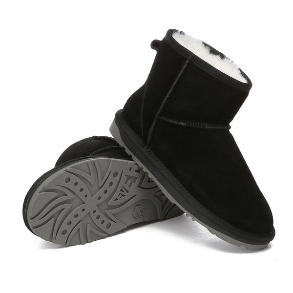 Black Mini Classic UGG Boots by EverUgg with plush sheepskin lining and durable rubber soles, perfect for cozy winter wear.