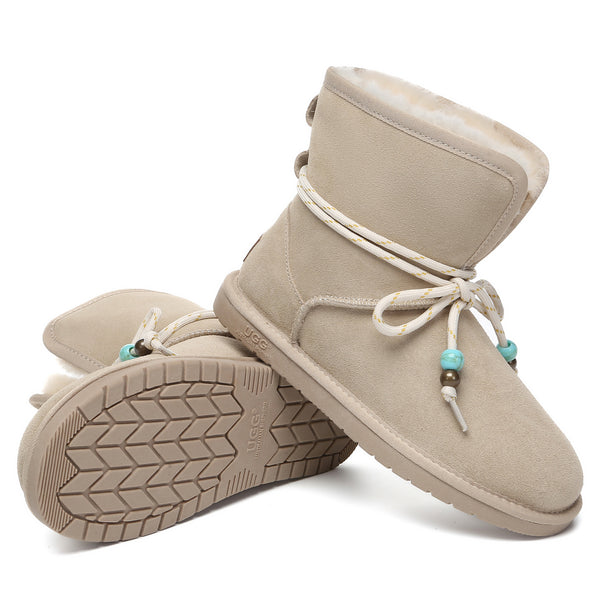 Mini foldable ankle UGG boots by EverUgg, showcasing stylish black shoes with a foldable design and cozy interior for women.