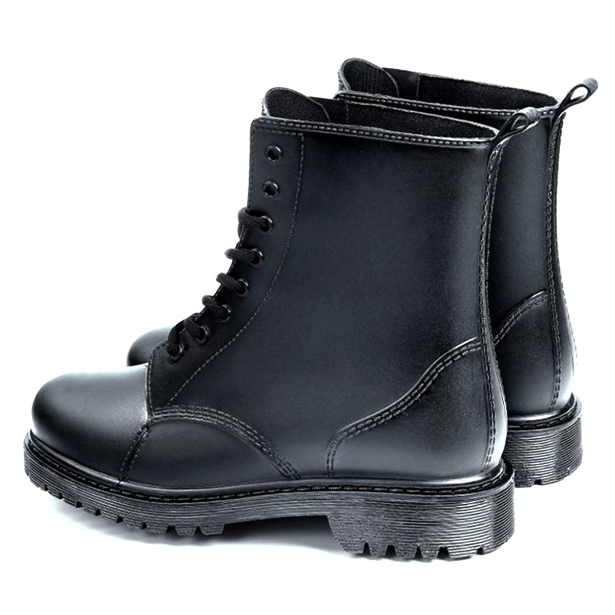 AllSlides Nomad Black waterproof boots shown in rain, featuring sturdy design and slip-resistant soles for wet weather protection.