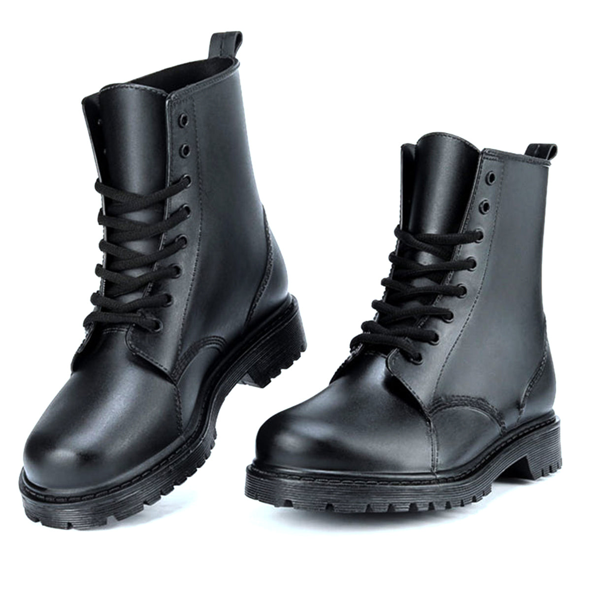 AllSlides Nomad black waterproof boots shown in rain, featuring durable material, sturdy soles, and stylish design for wet weather.