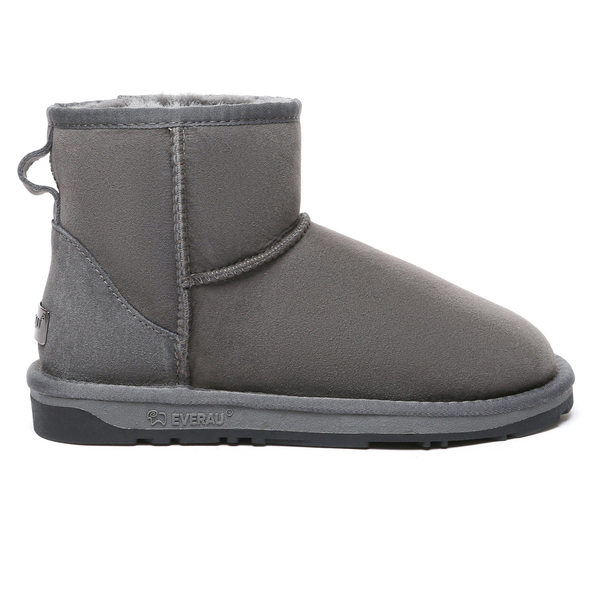 EverUgg premium mini classic sheepskin UGG boots for women, showing beige ankle-length shoes with soft sheepskin lining and suede exterior.