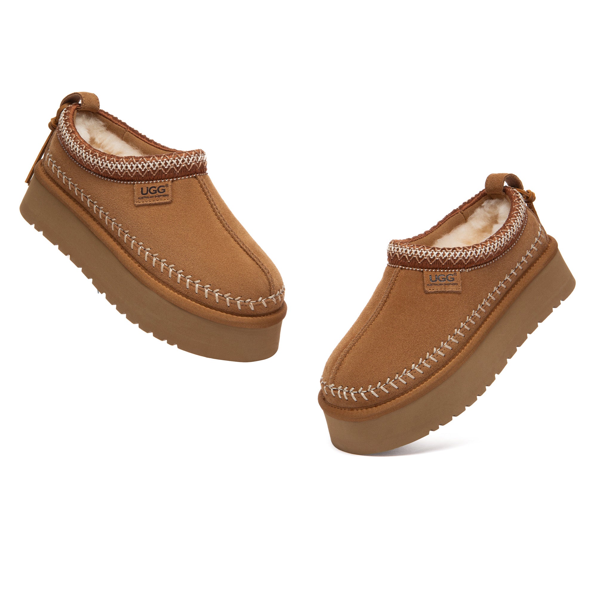 EverUgg Premium Stitch Platform UGG slippers showing soft suede exterior and cozy interior with platform sole design.