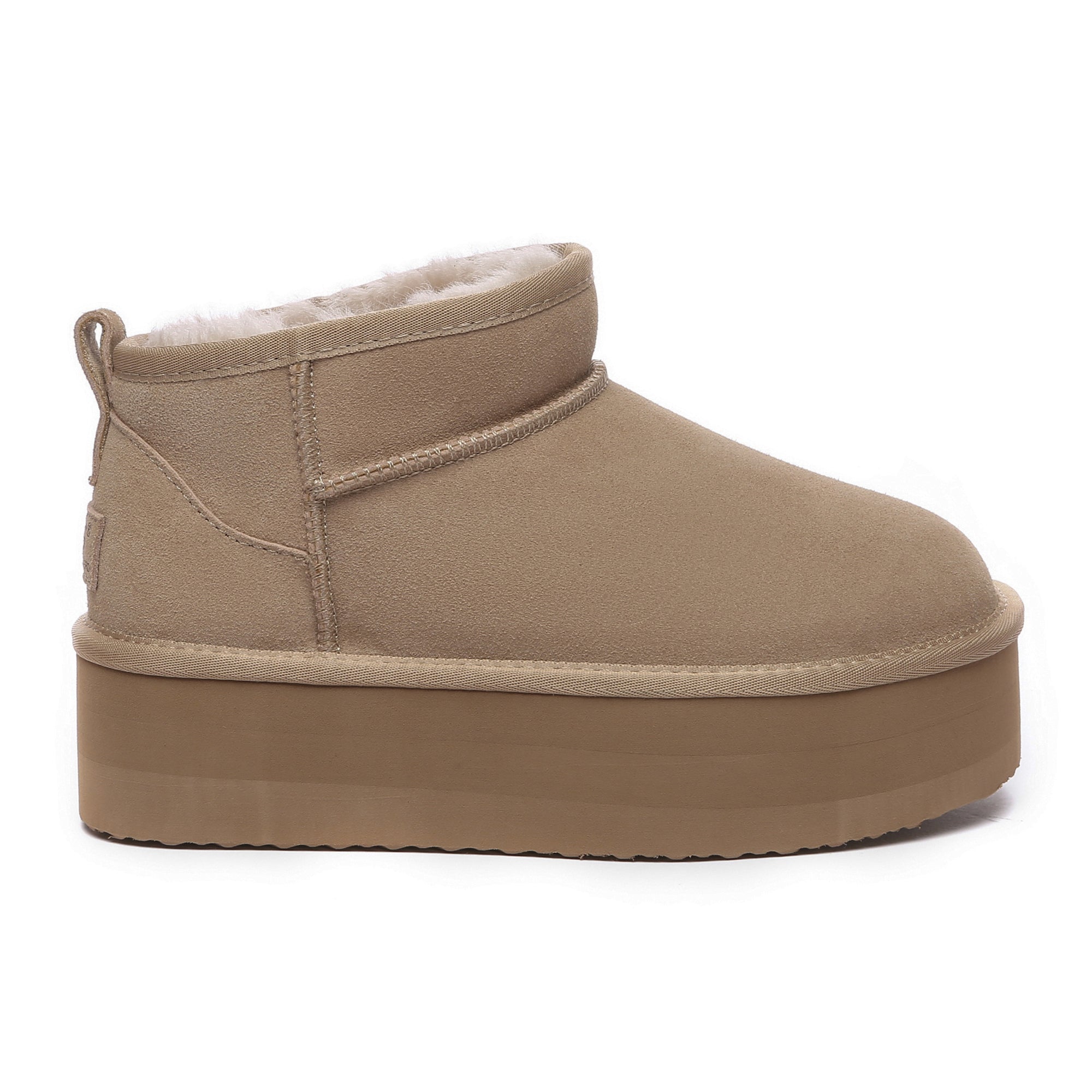Close-up of EverUgg Premium Ultra Mini Platform UGG Boots in sand color, showing the textured sole and sleek design.