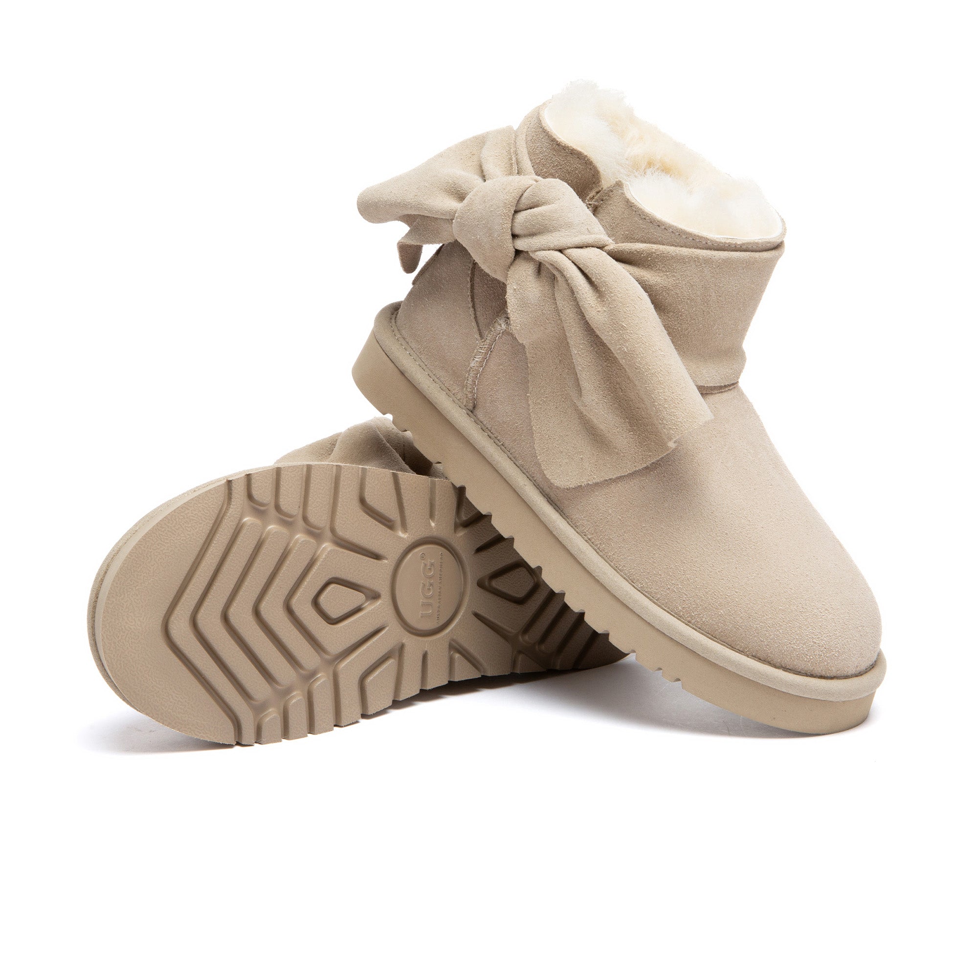 EverUgg Molle UGG boots featuring plush sheepskin lining and durable suede exterior, stylishly designed for cold weather.