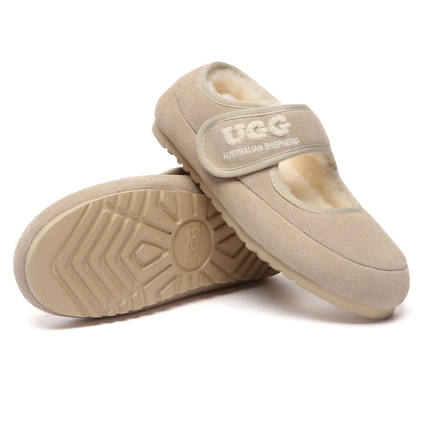 EverUgg shearling logo strap UGG slippers for women with plush lining and comfortable slip-on design.